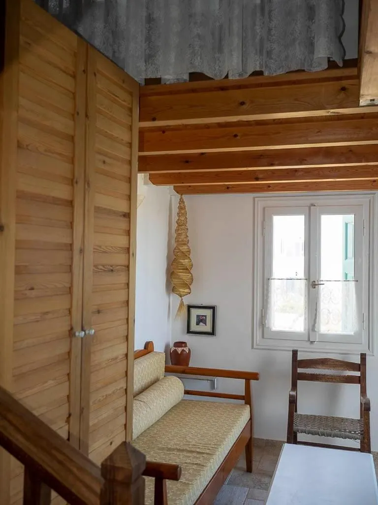 Seating area, Bed in Anemoessa Studios