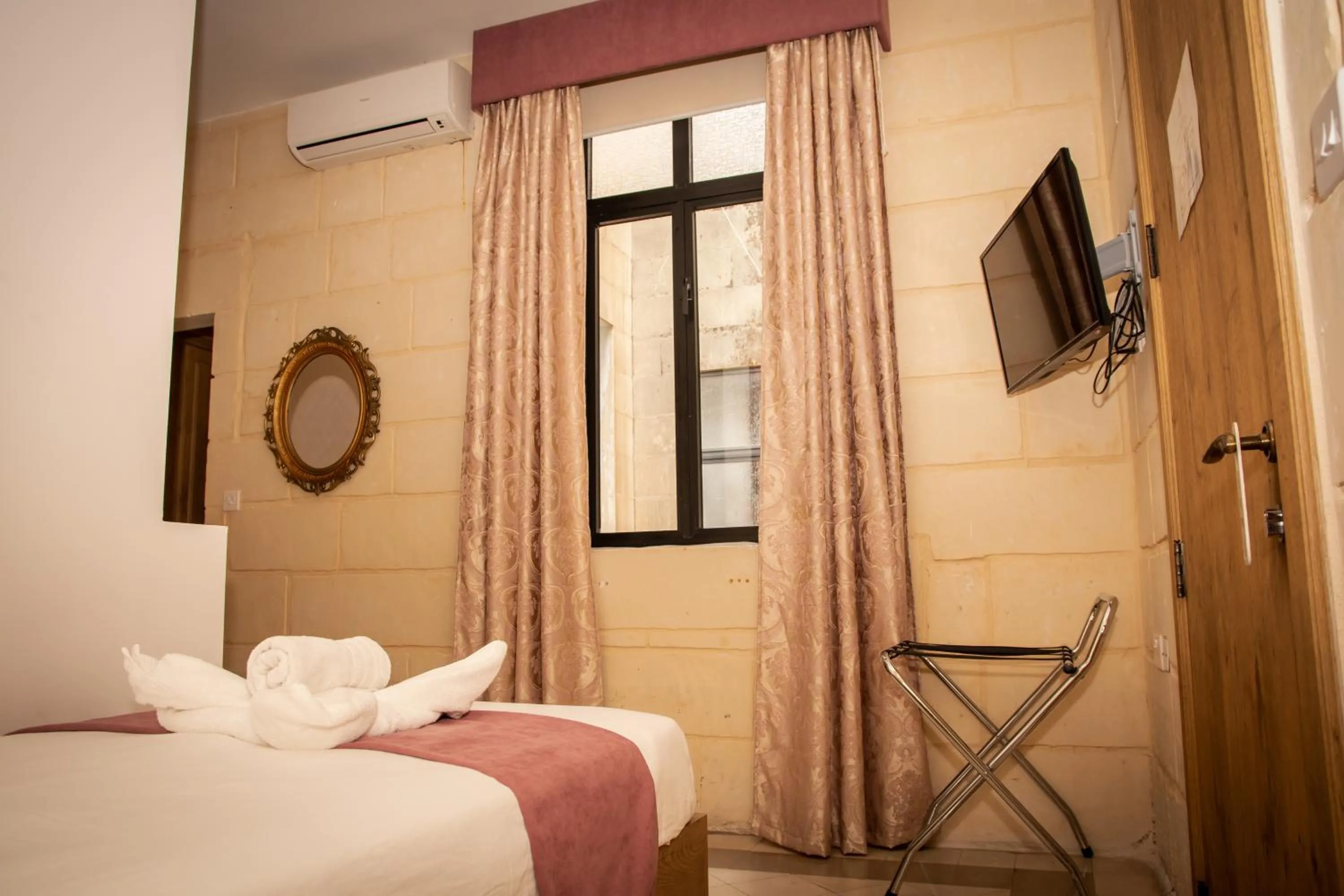 Bed in Point de vue Guesthouse