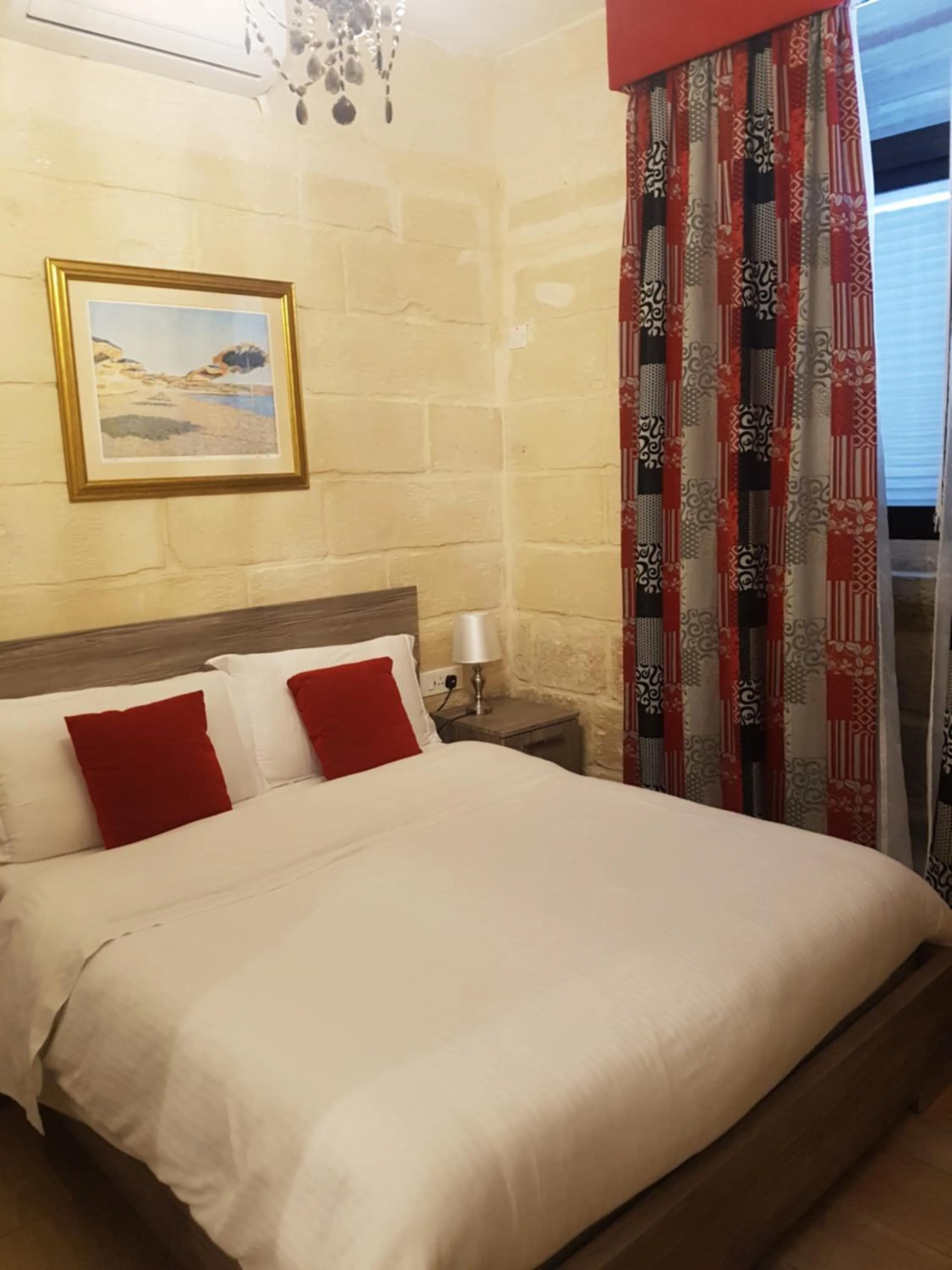 Bed in Point de vue Guesthouse