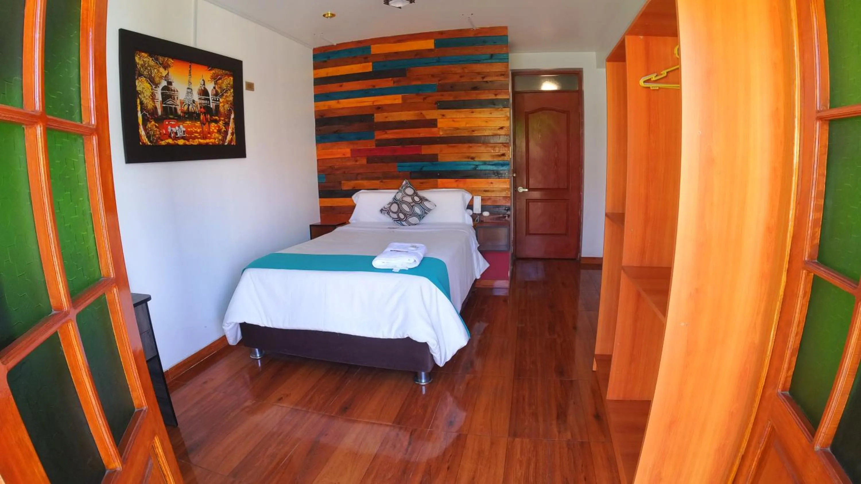 Bed in Sumaq Wari Hotel