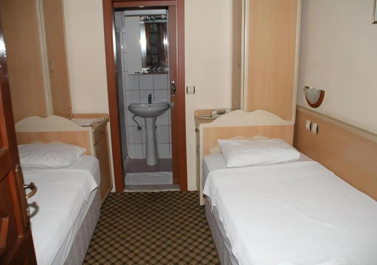 Bed in Hotel Karyatit Kaleici