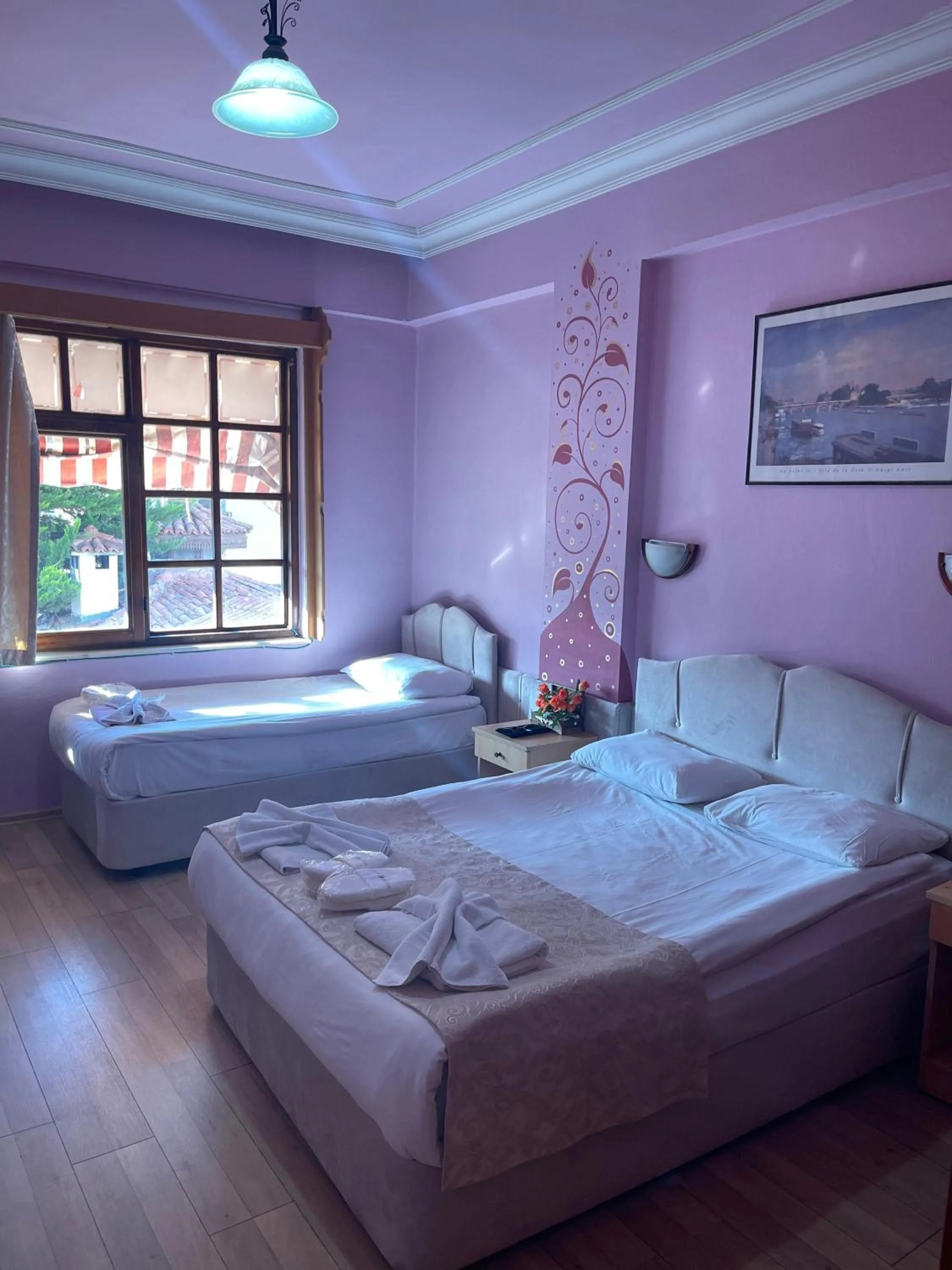 Bed in Hotel Karyatit Kaleici