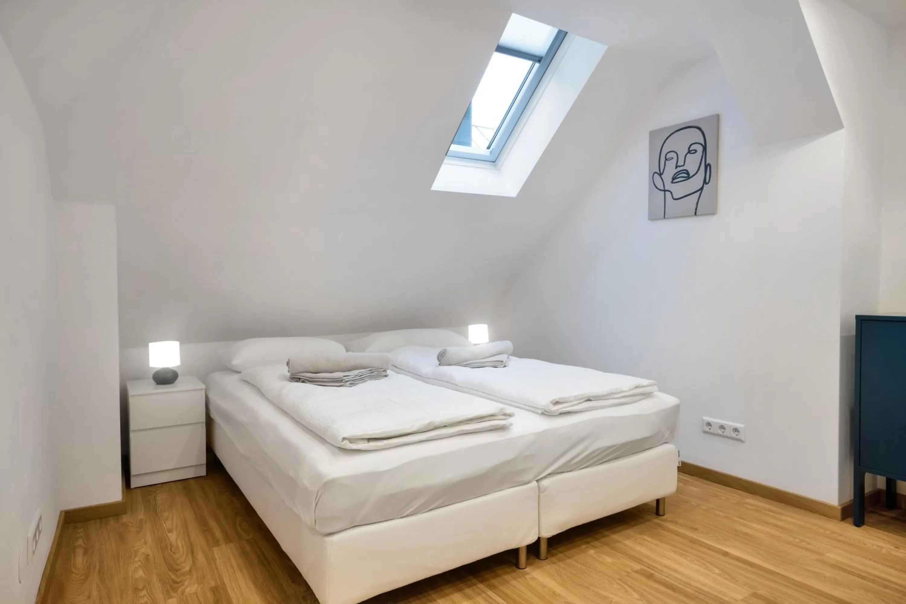 Bedroom, Bed in easy-flat Hauptplatz - City Center Apartments with a Kitchen