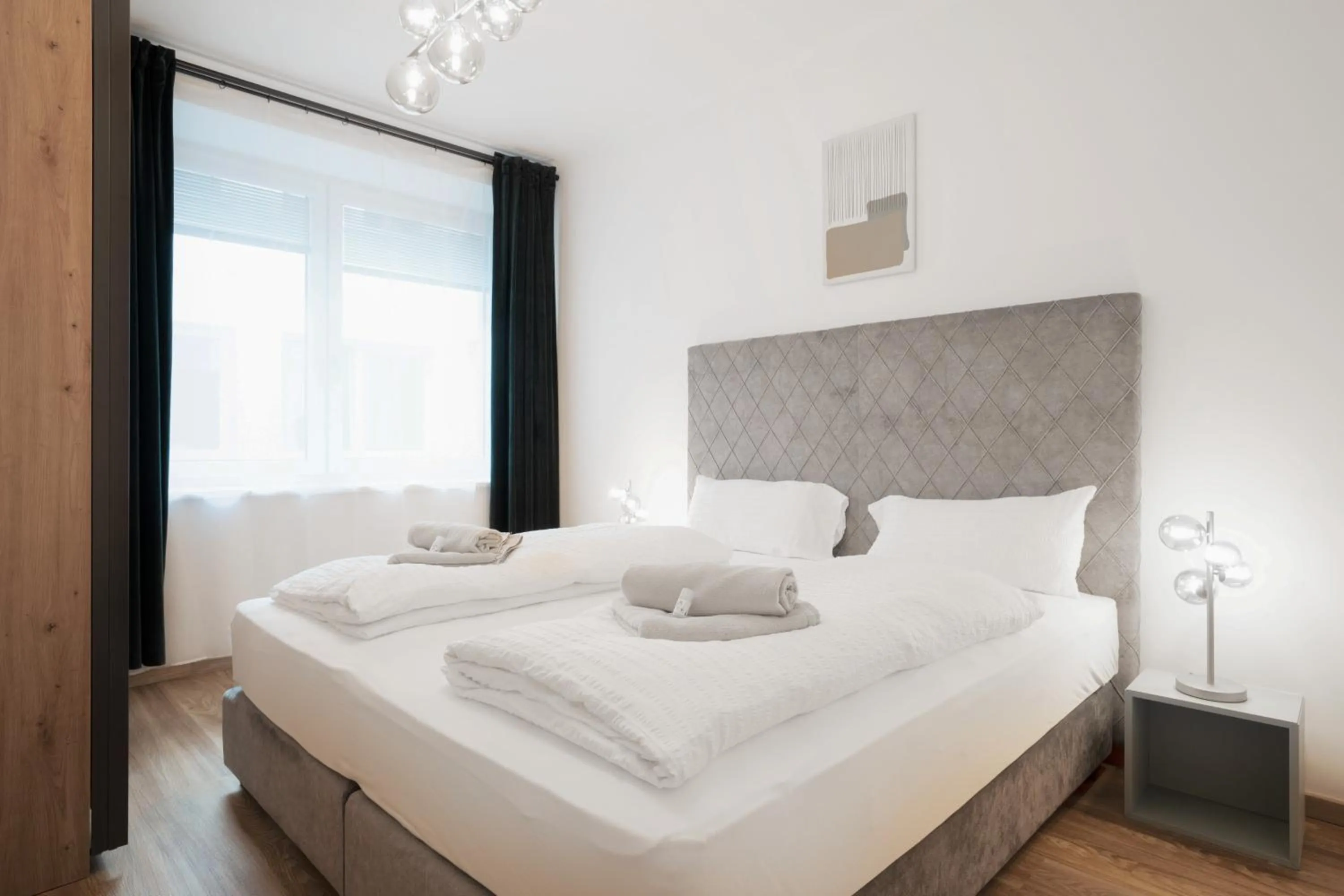 Bed in easy-flat Hauptplatz - City Center Apartments with a Kitchen