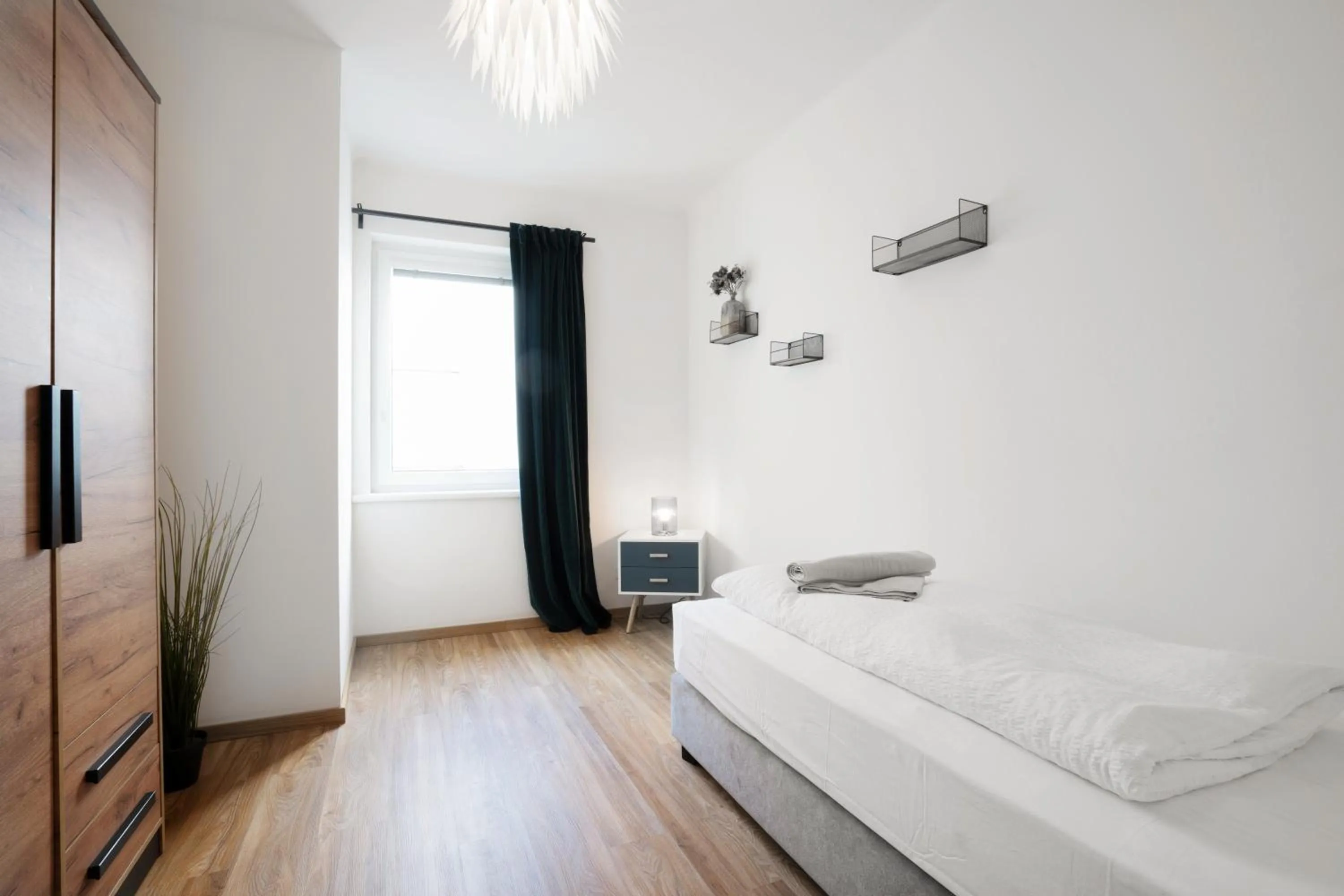 Bed in easy-flat Hauptplatz - City Center Apartments with a Kitchen