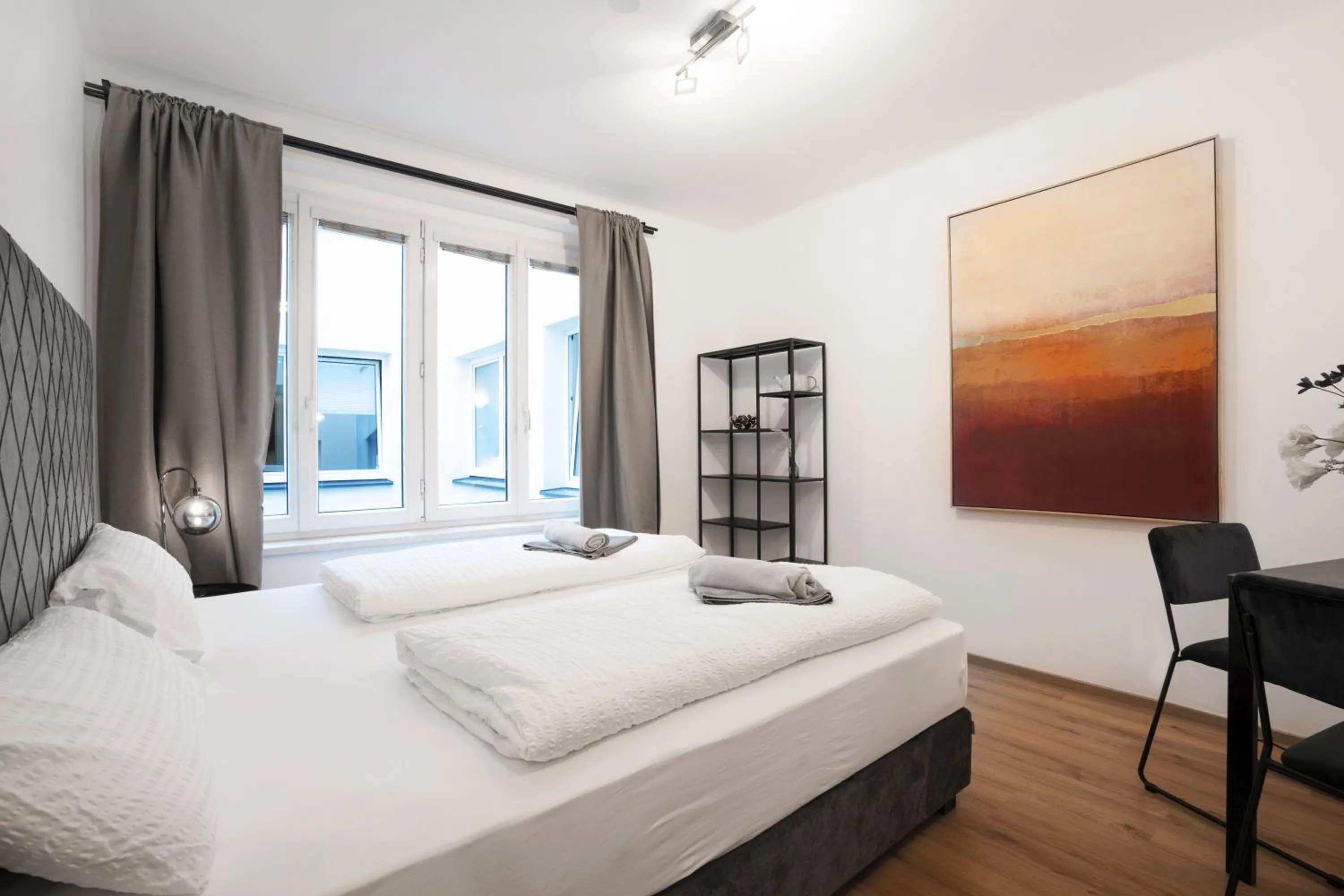 Bed in easy-flat Hauptplatz - City Center Apartments with a Kitchen