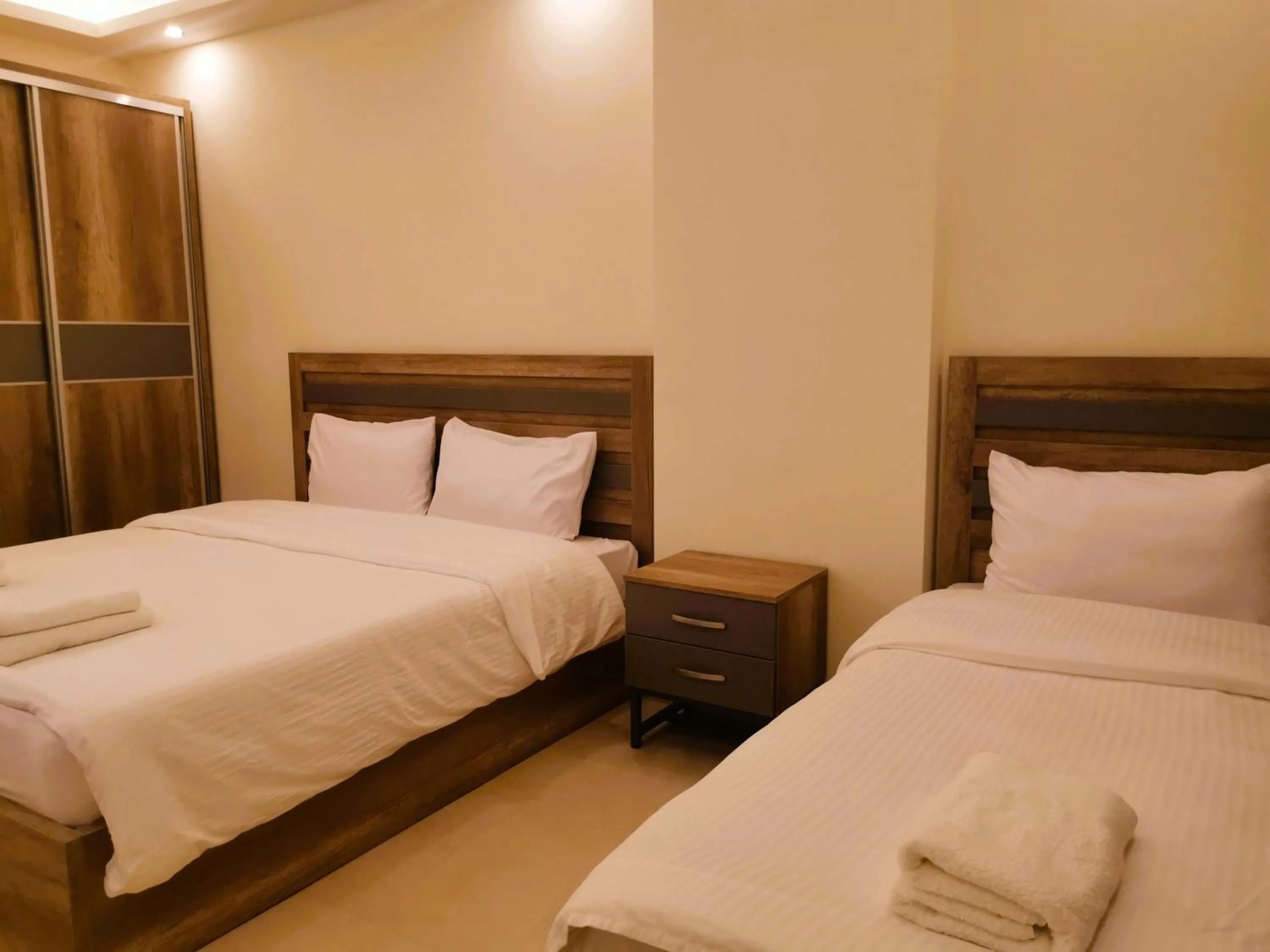 Bed in Aster Hotel Aqaba