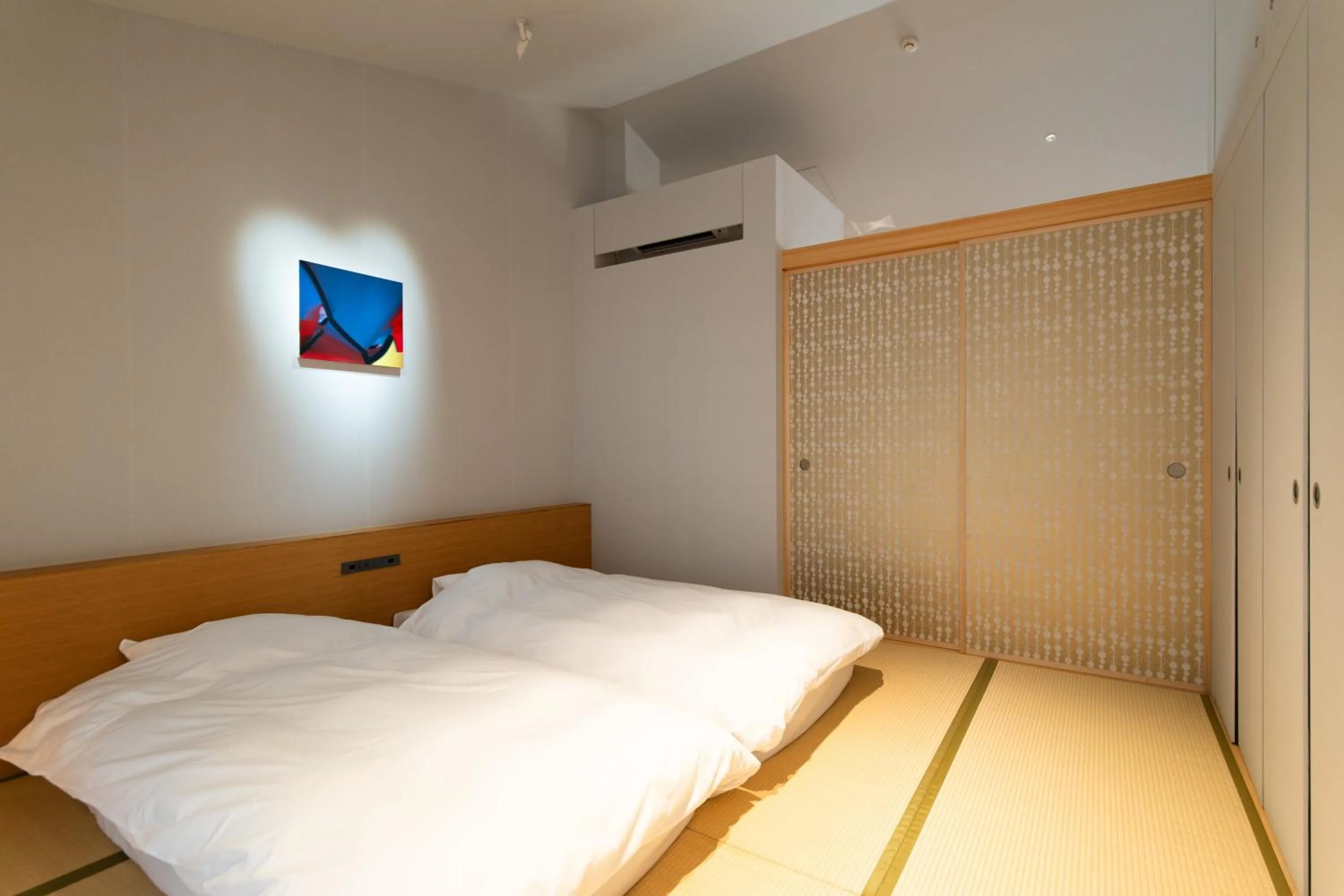 Bed in Naoshima Ryokan Roka