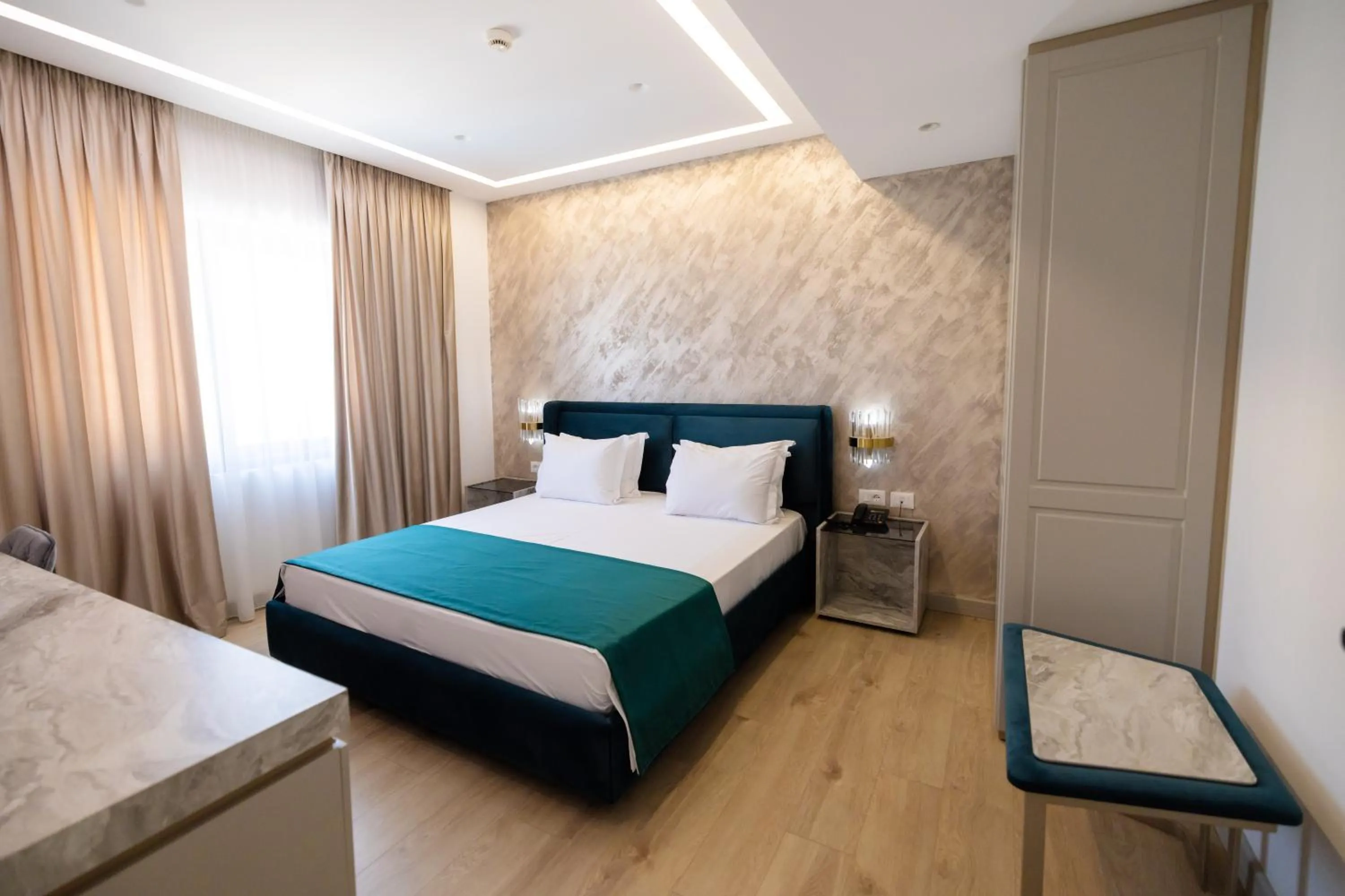 Bed in Chimaera Hotel