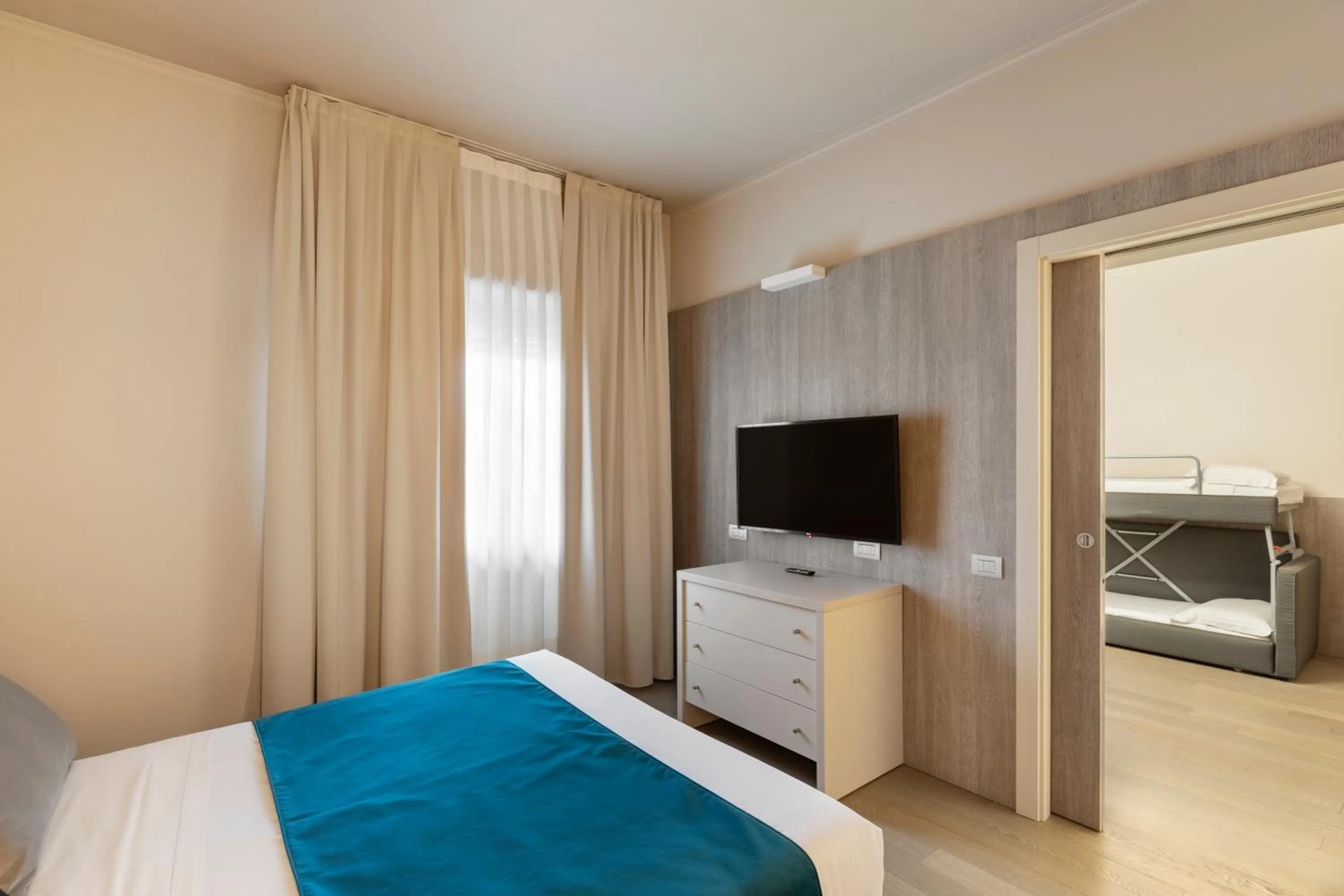 Bed in Living Hotel Milano