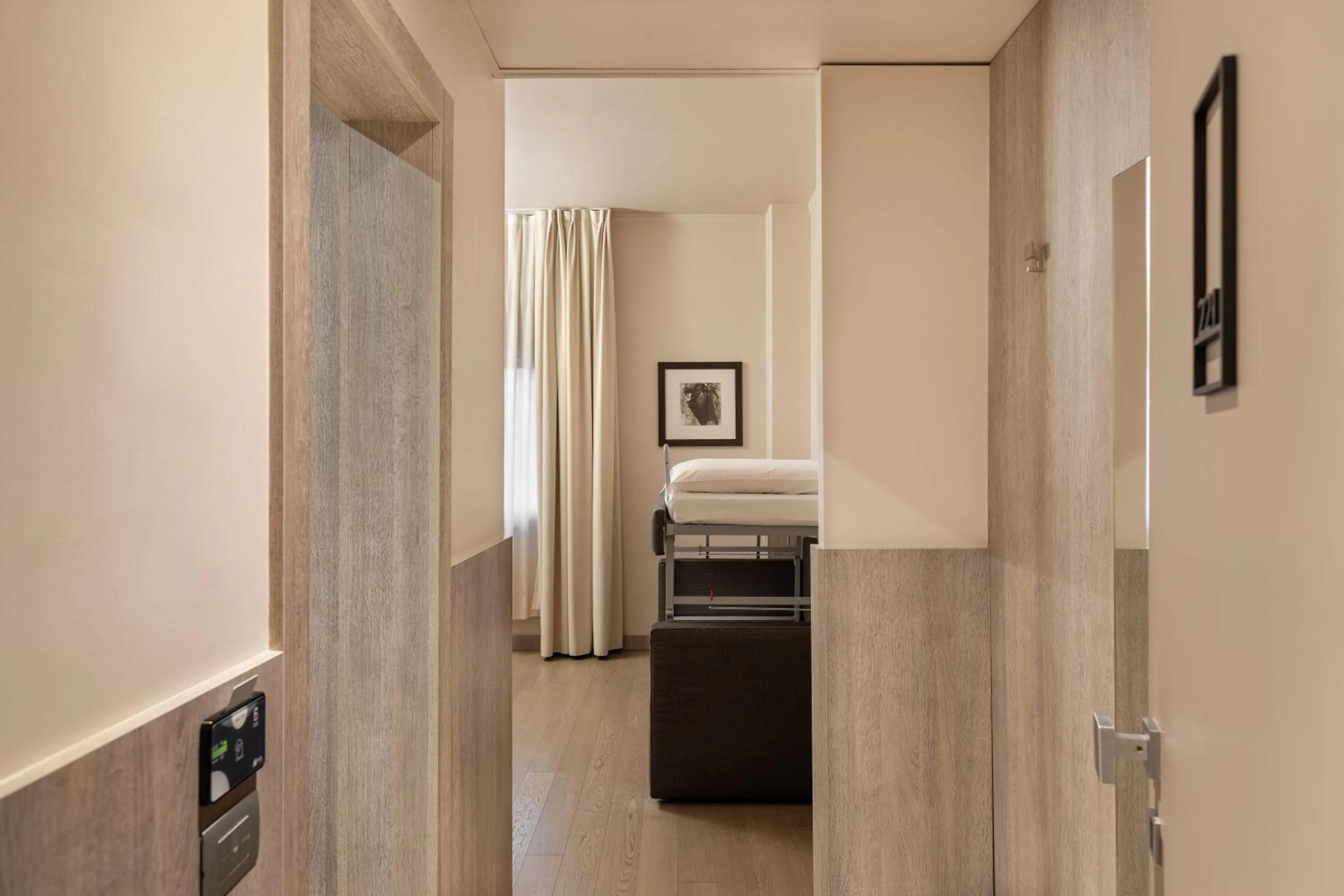 Bed in Living Hotel Milano