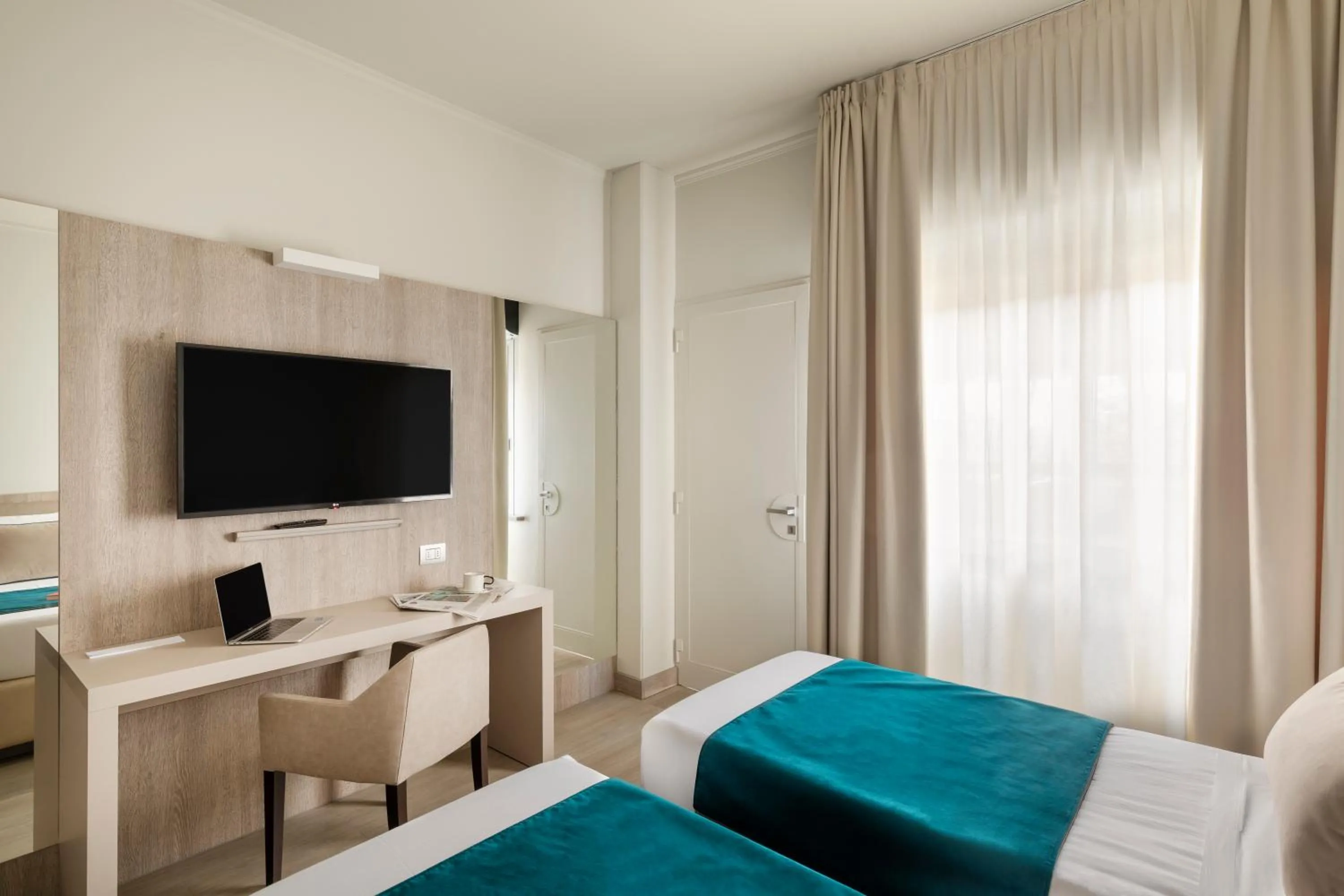 Bed in Living Hotel Milano