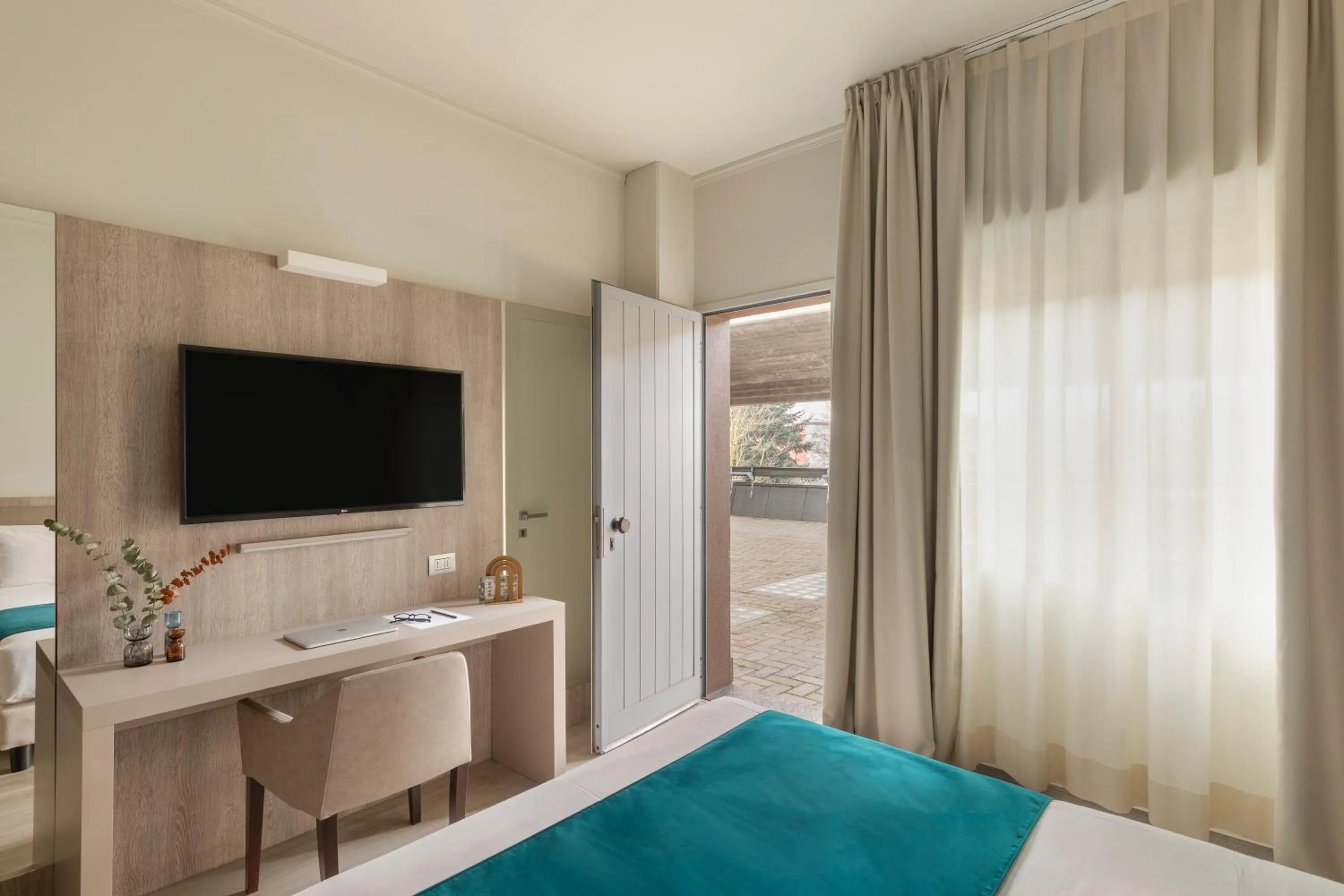 Bed in Living Hotel Milano