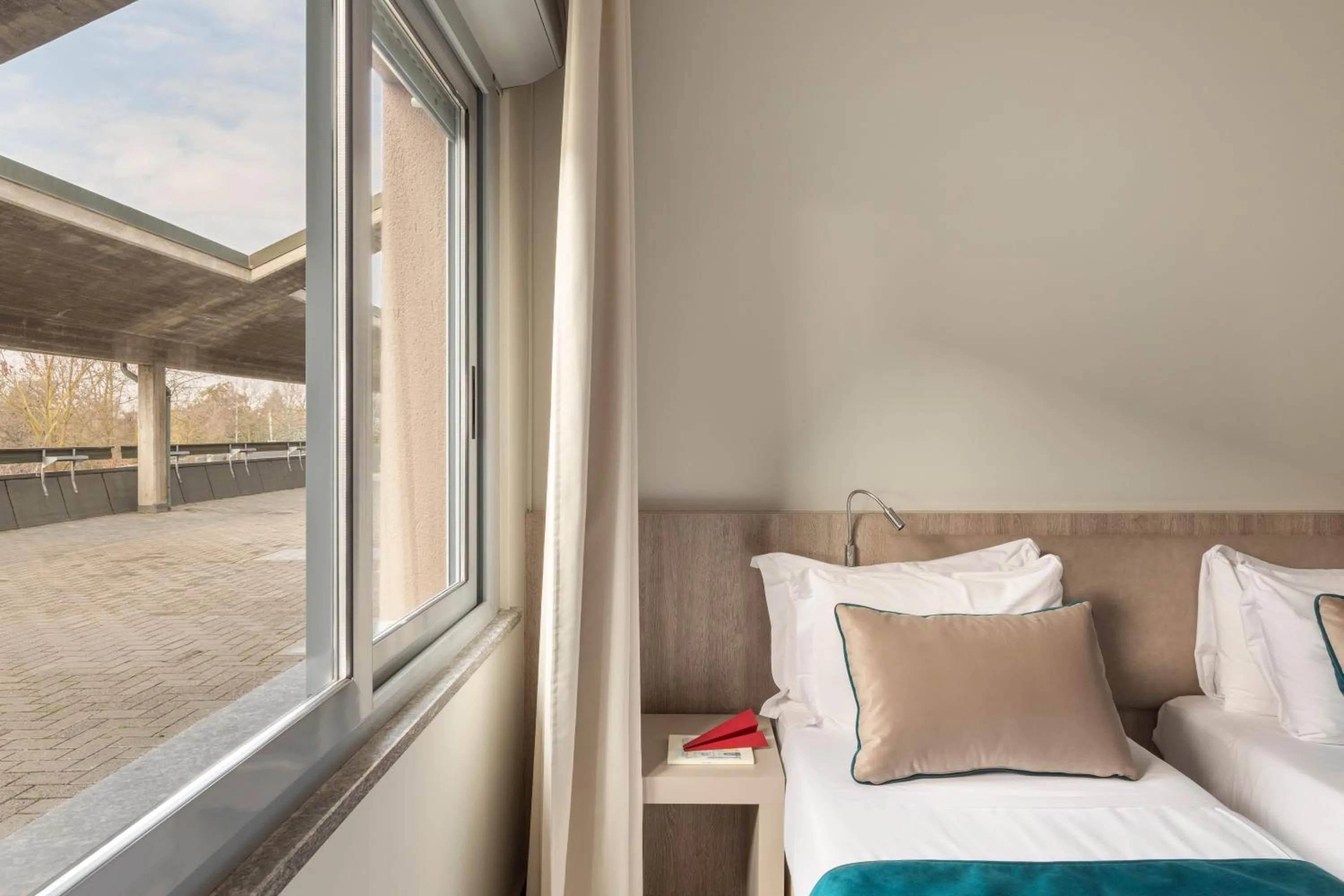 Bed in Living Hotel Milano