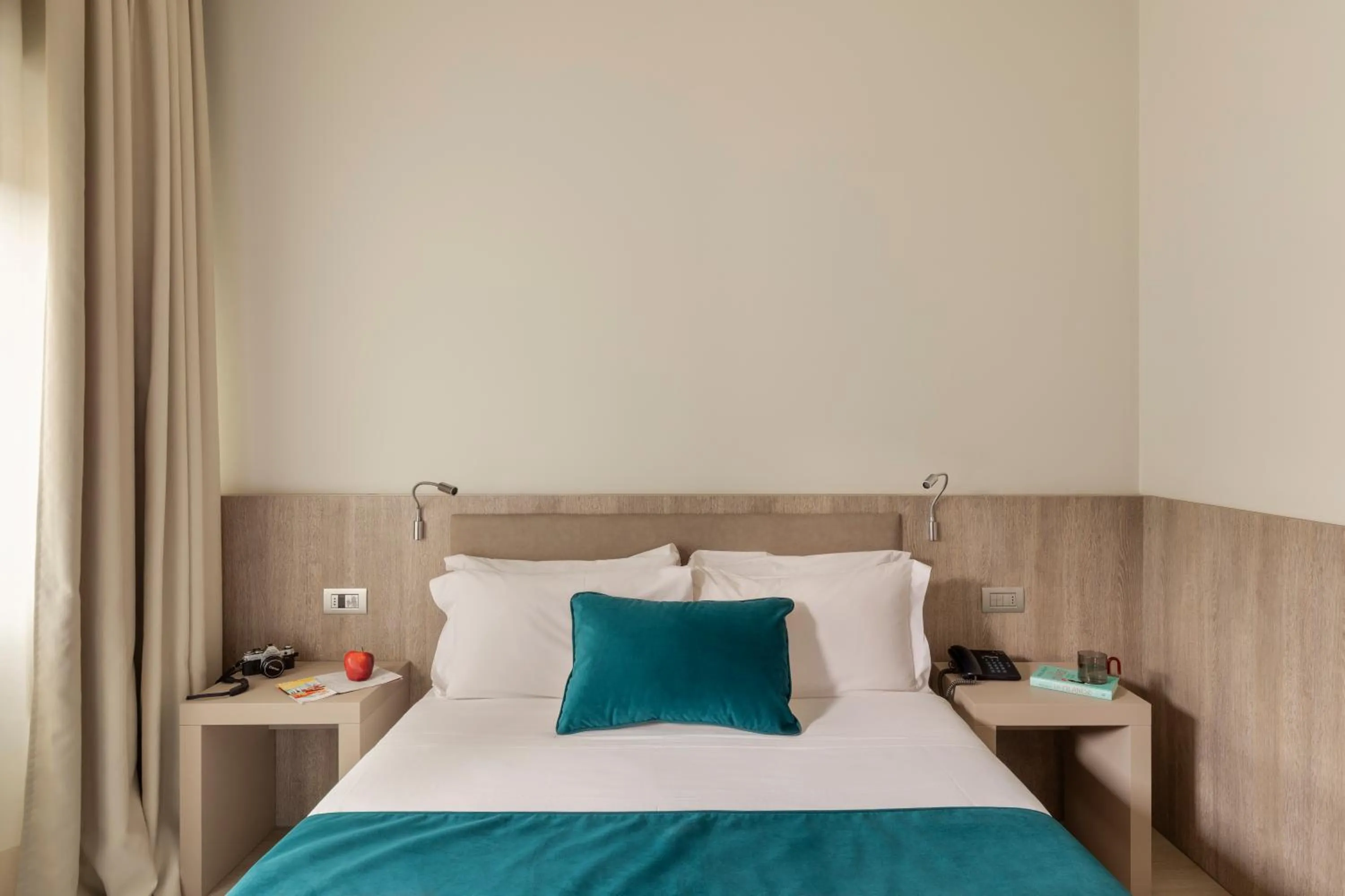 Bed in Living Hotel Milano