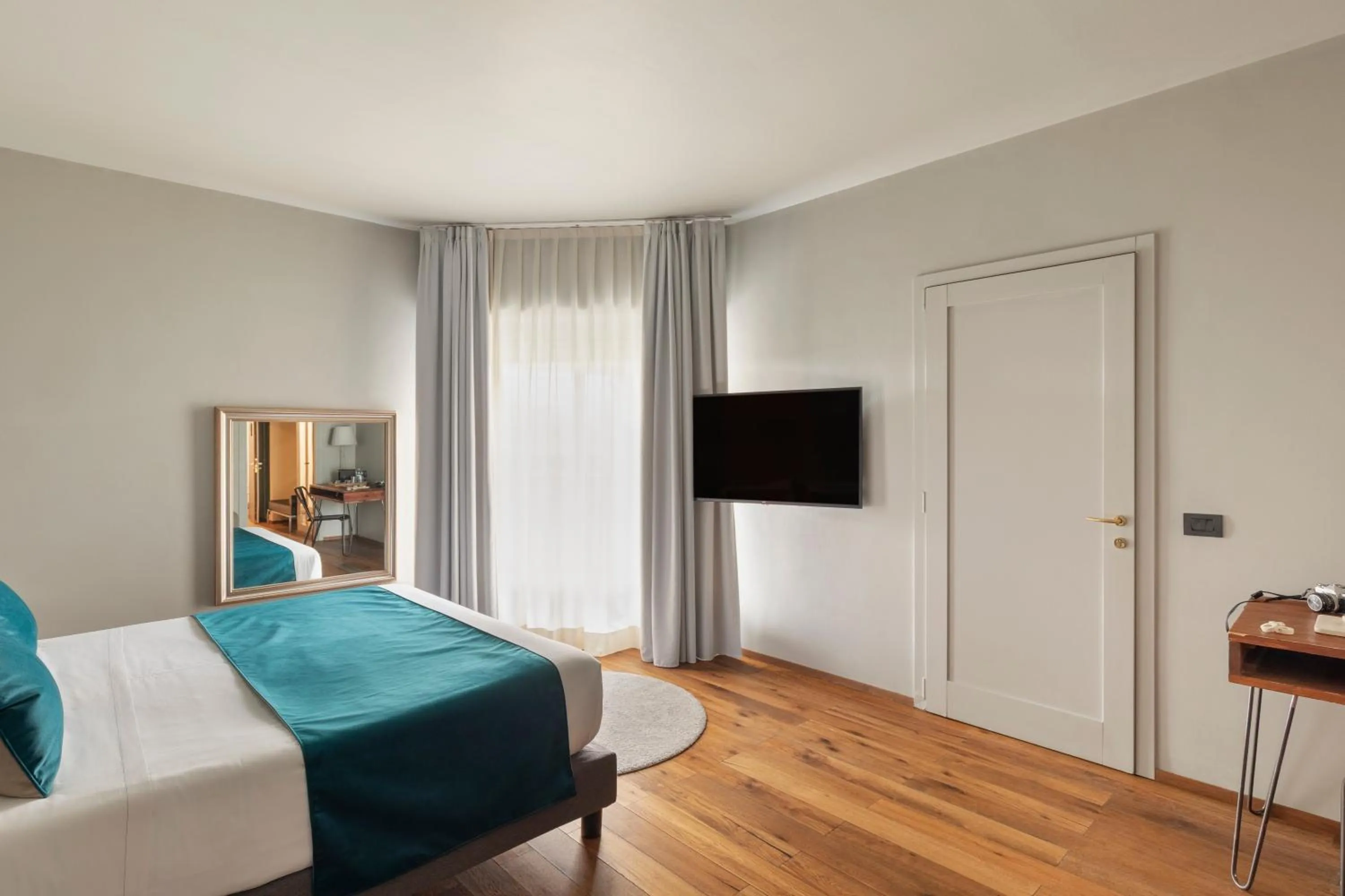 Bed in Living Hotel Milano