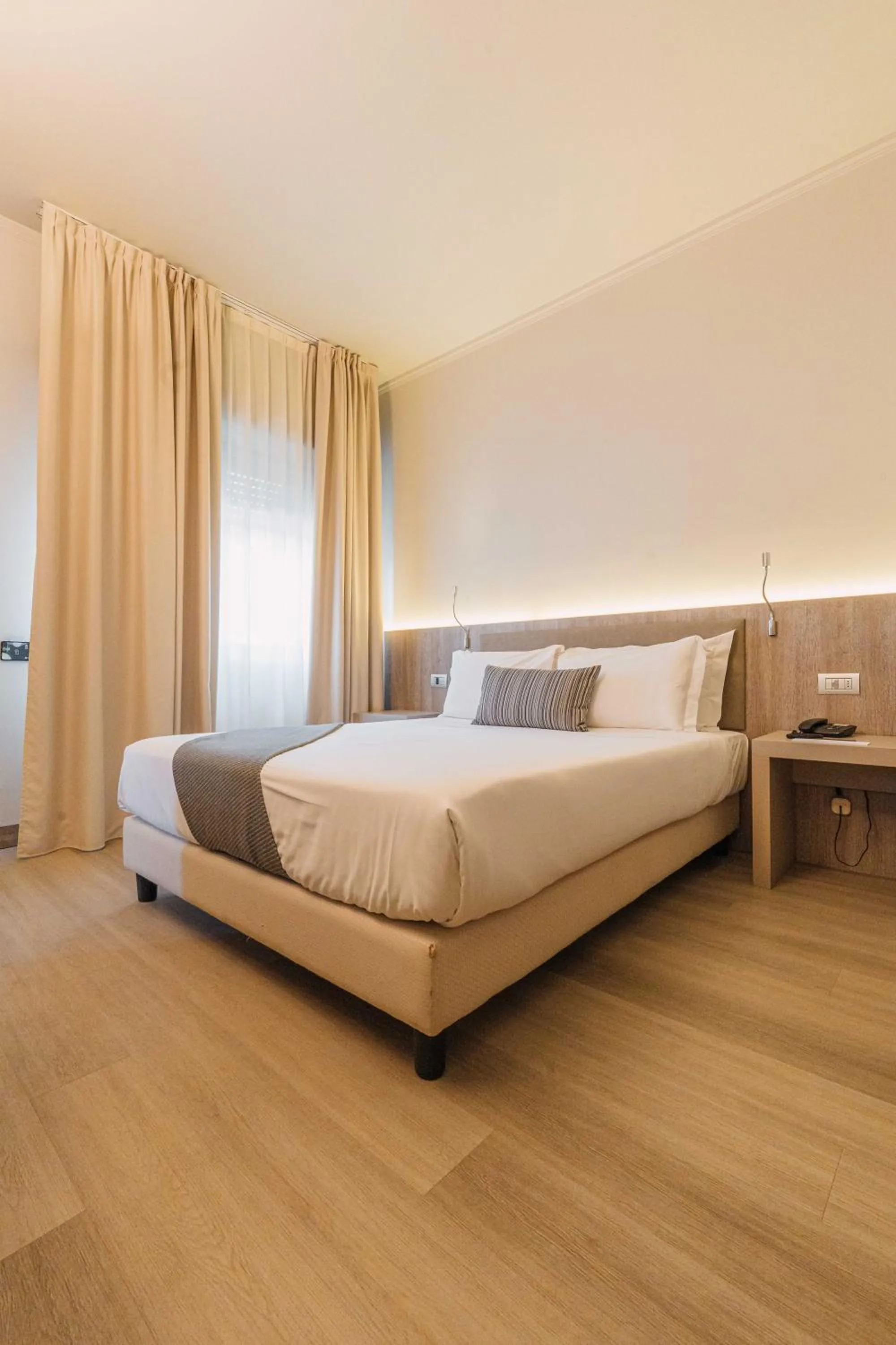 Bedroom, Bed in Living Hotel Milano
