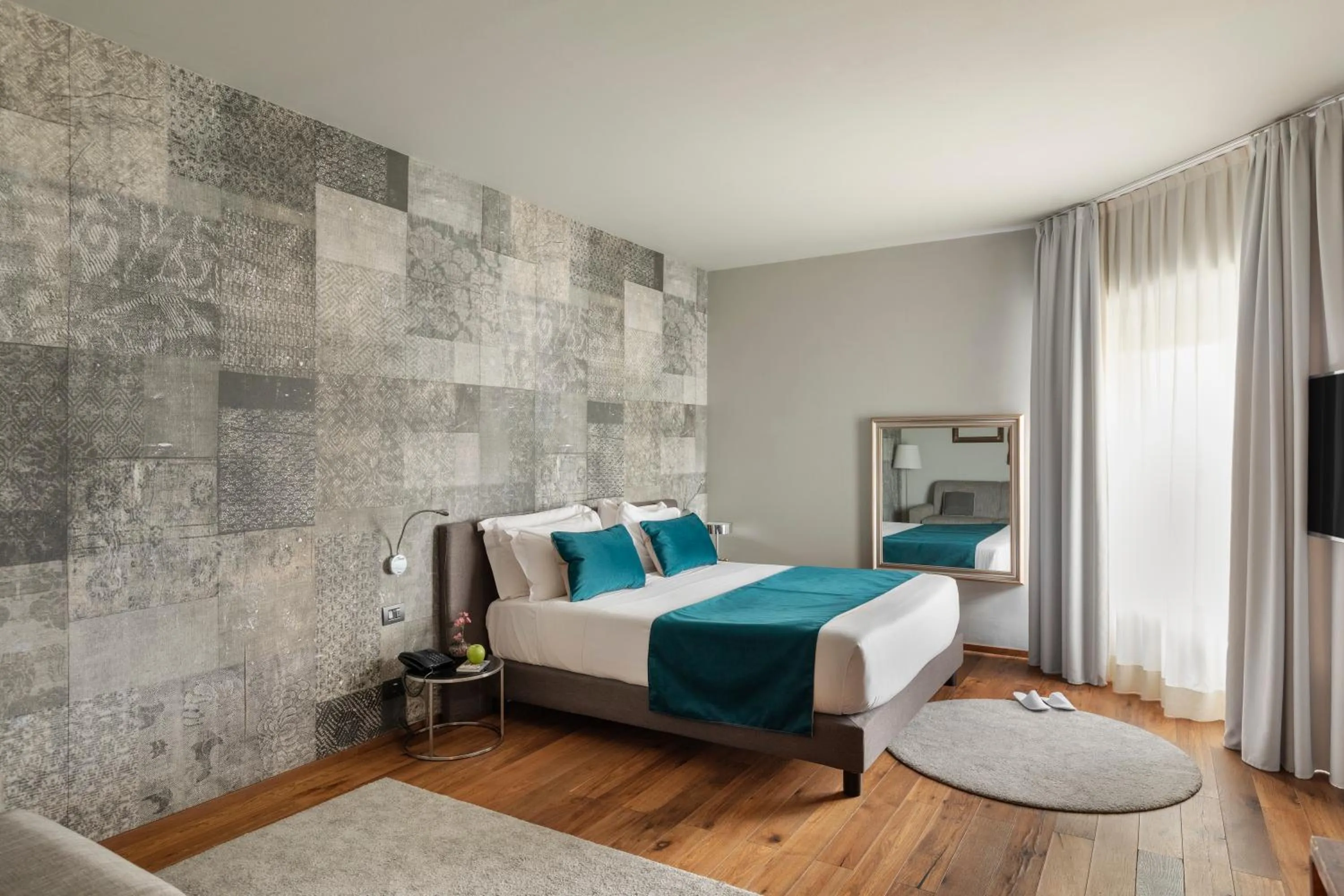 Bed in Living Hotel Milano