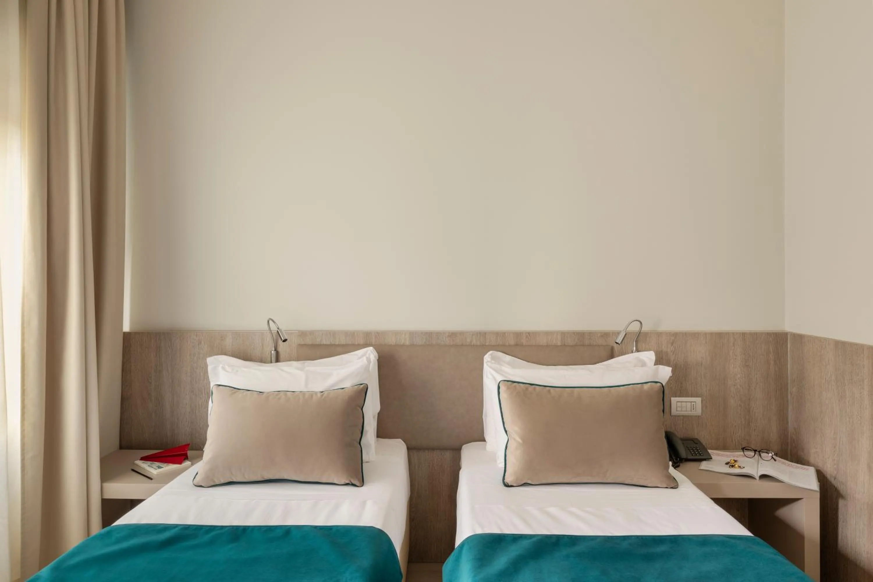 Bed in Living Hotel Milano