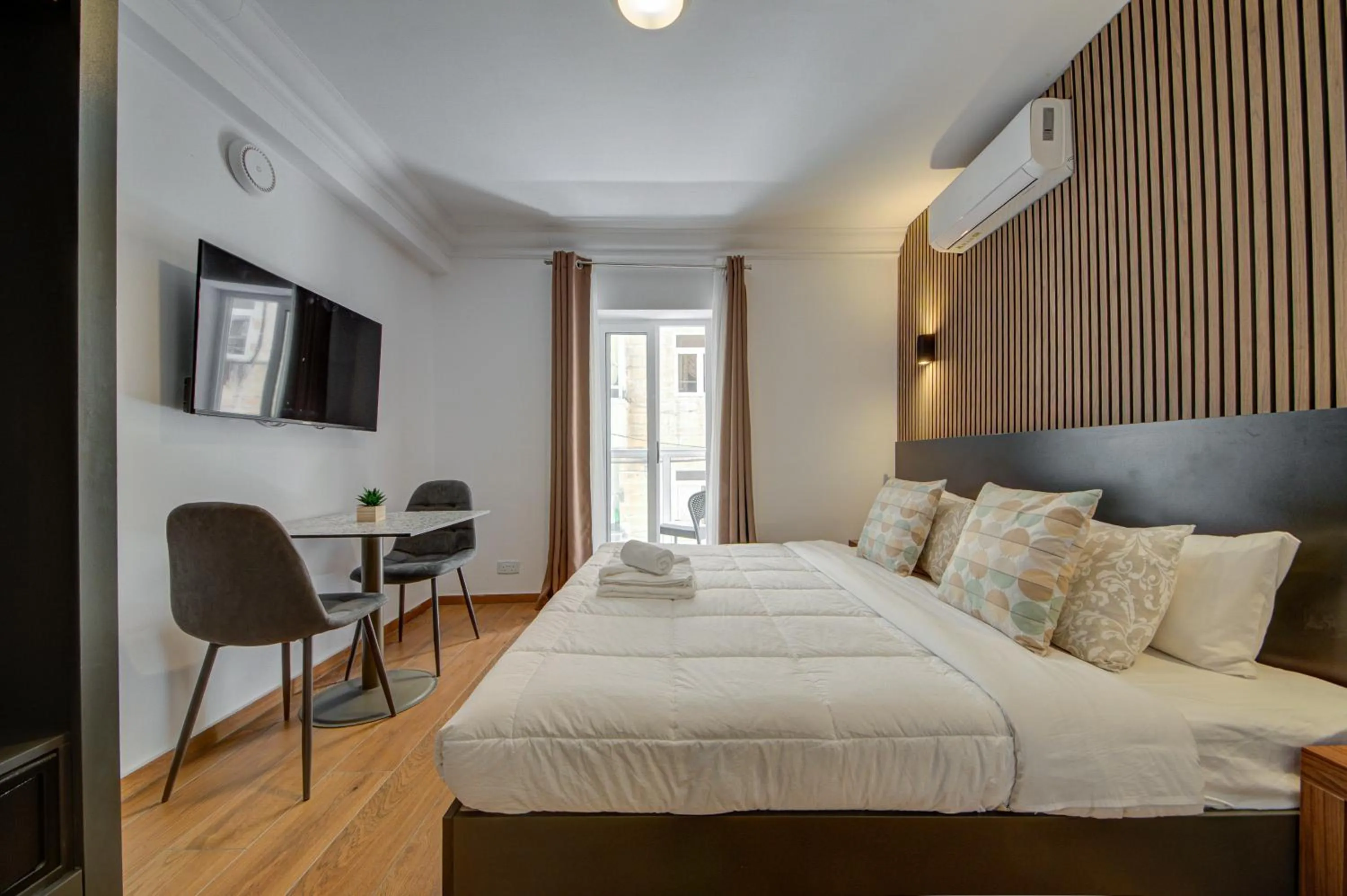 Bed in Marina Suites & apartments - Self catering - by Tritoni hotels