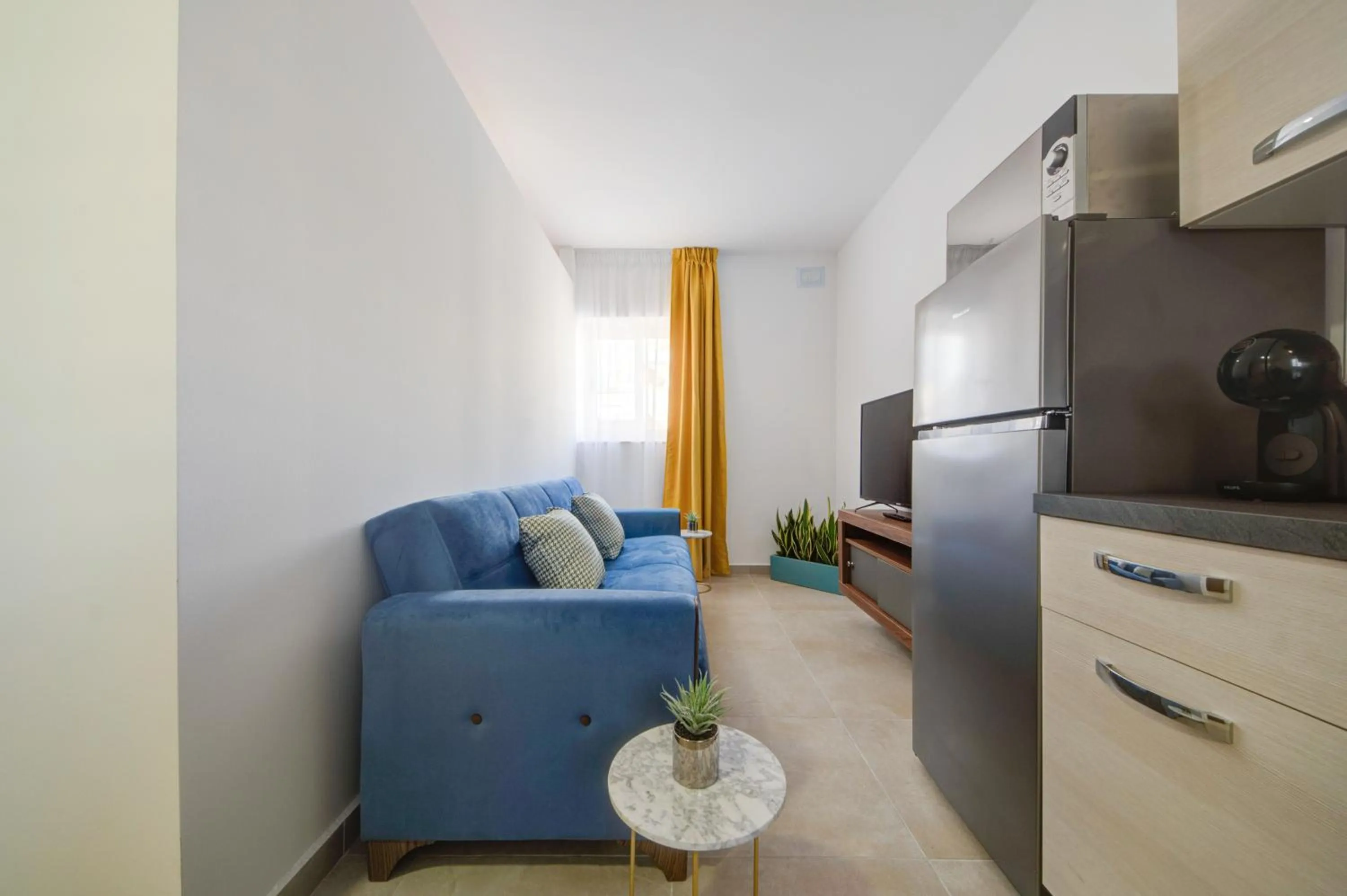 Seating area in Marina Suites & apartments - Self catering - by Tritoni hotels