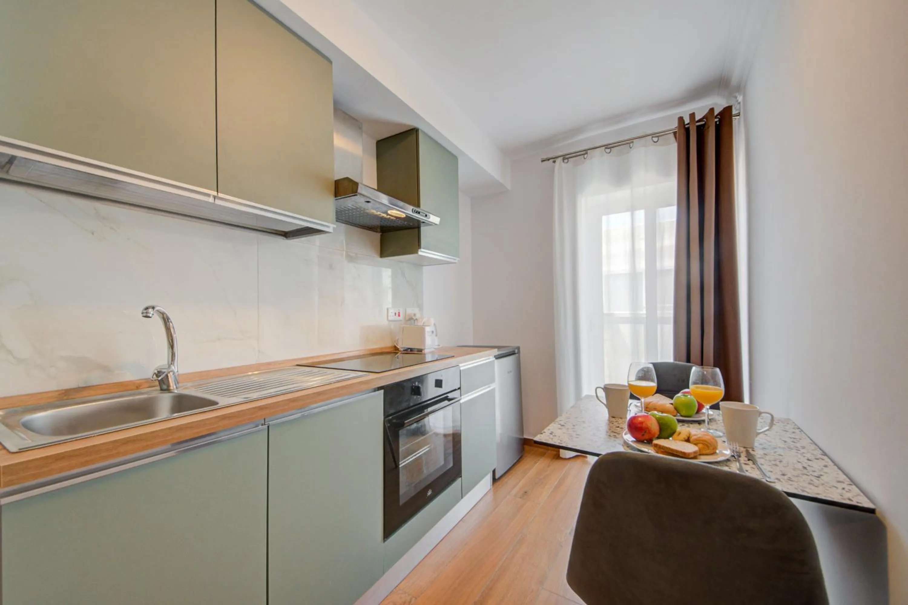 Kitchen or kitchenette in Marina Suites & apartments - Self catering - by Tritoni hotels