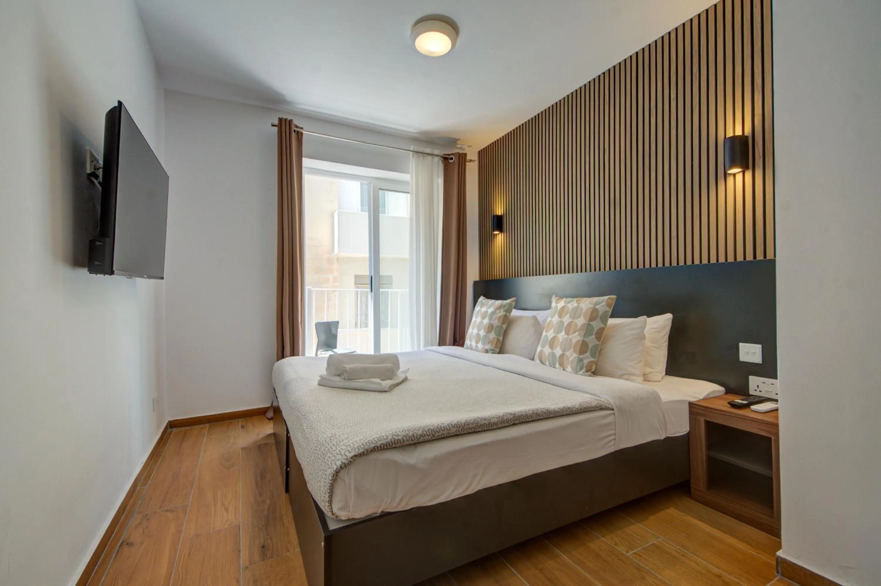 Bed in Marina Suites & apartments - Self catering - by Tritoni hotels