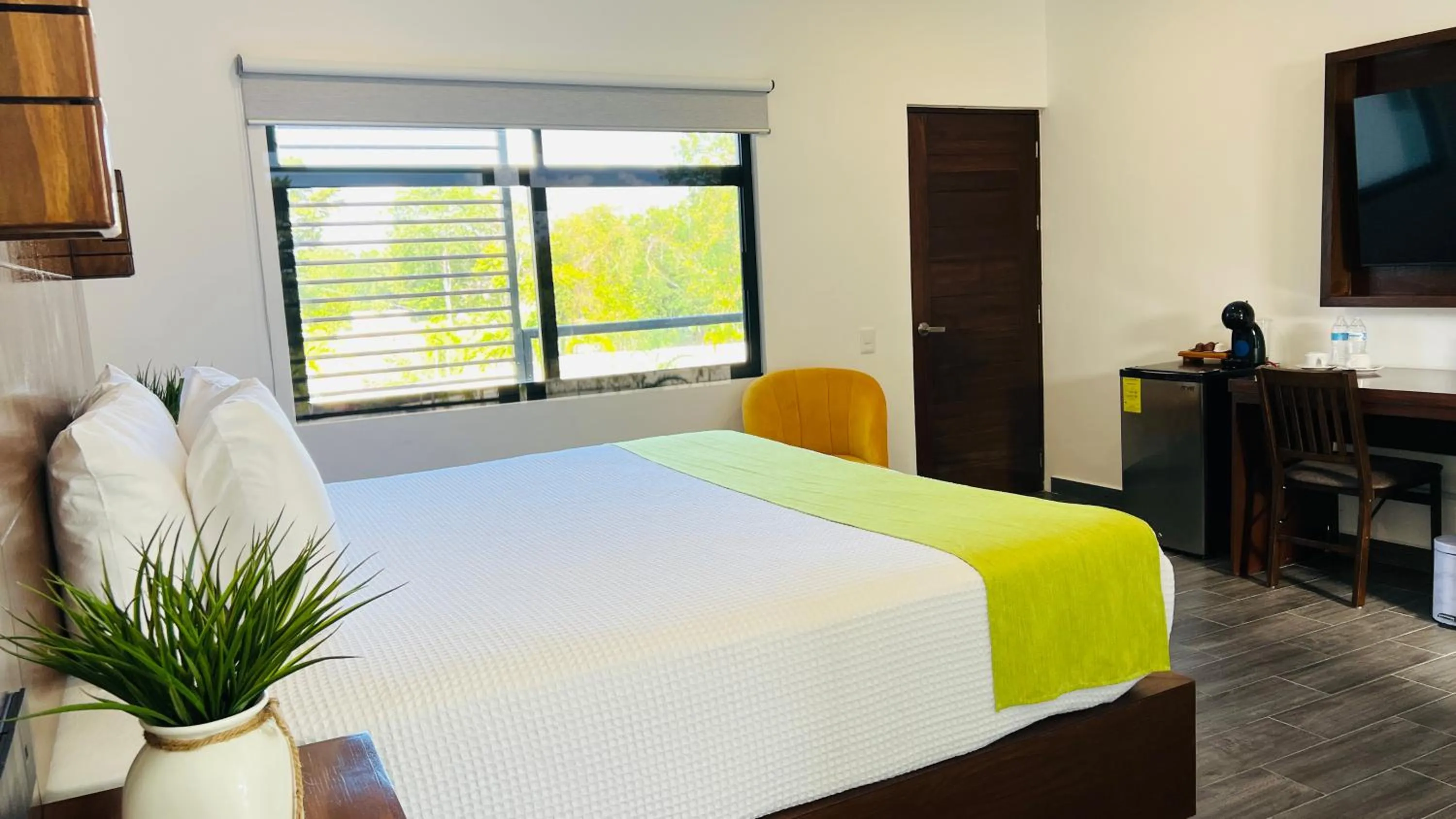 Bed in Mayan Water Hotel