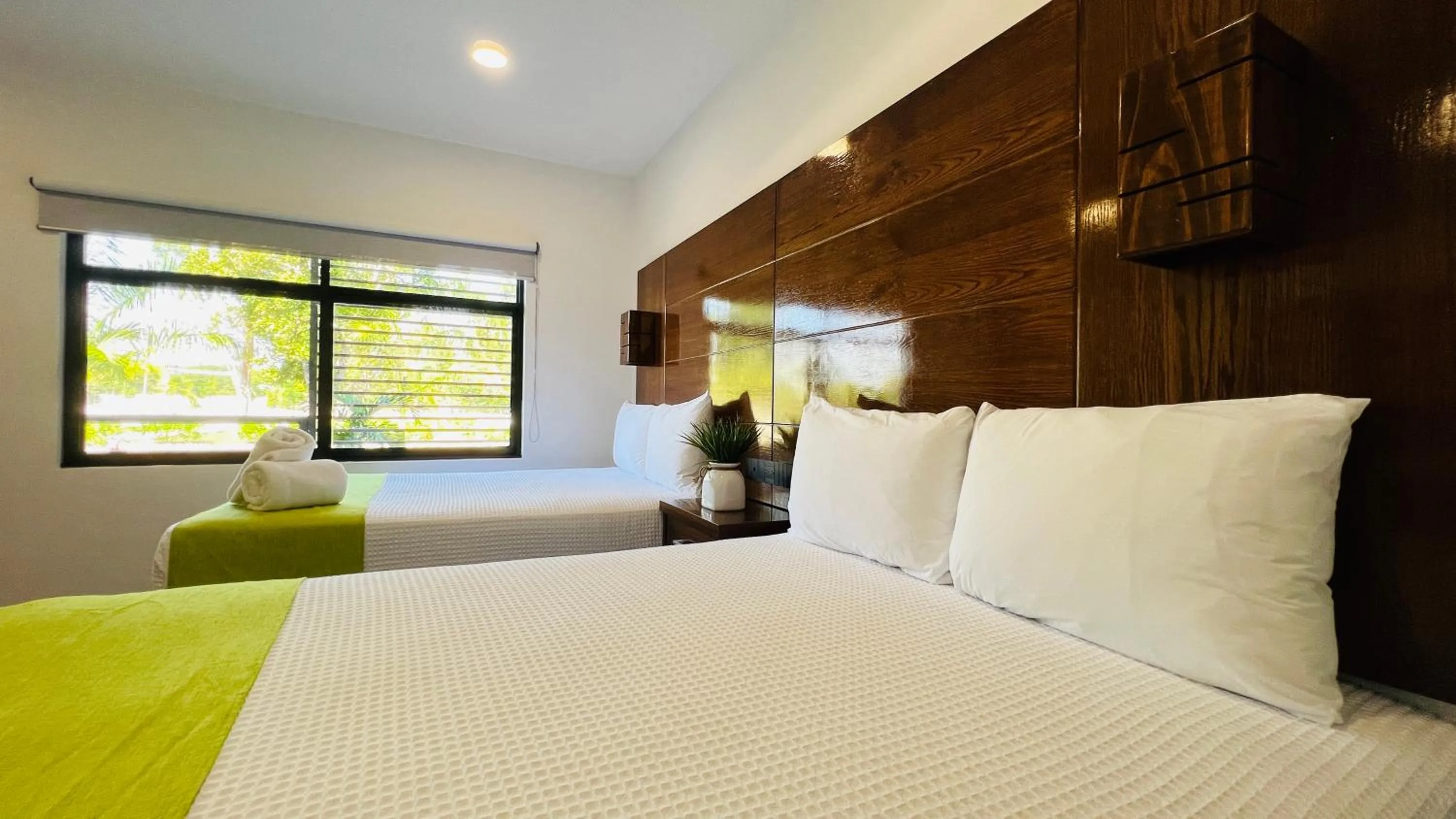 Bed in Mayan Water Hotel