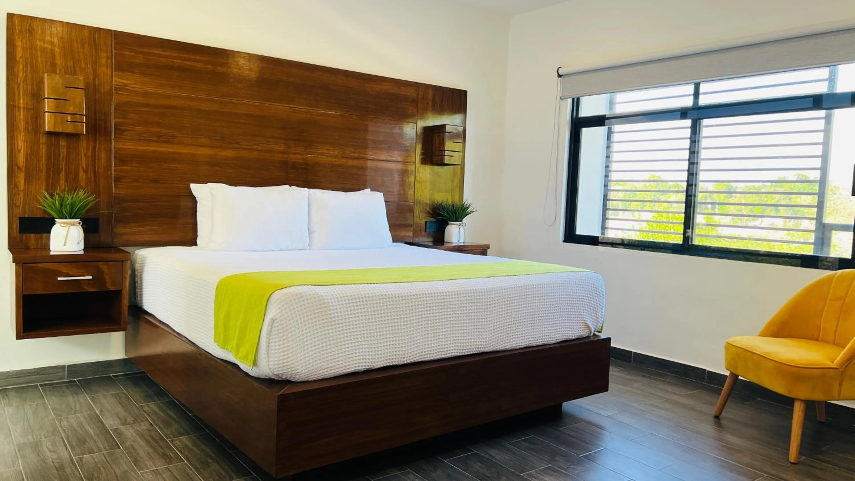 Bed in Mayan Water Hotel