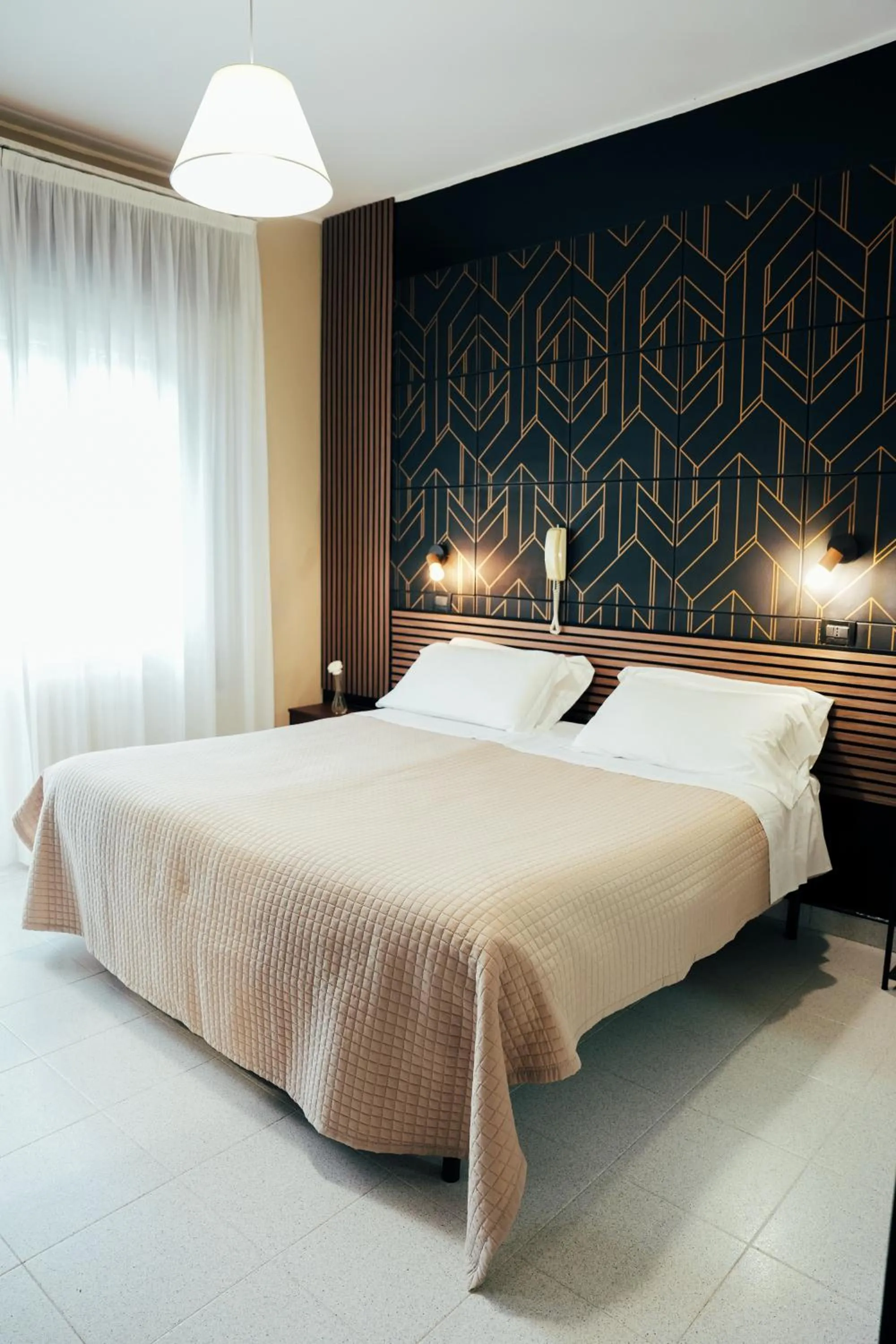 Bed in Hotel Marconi