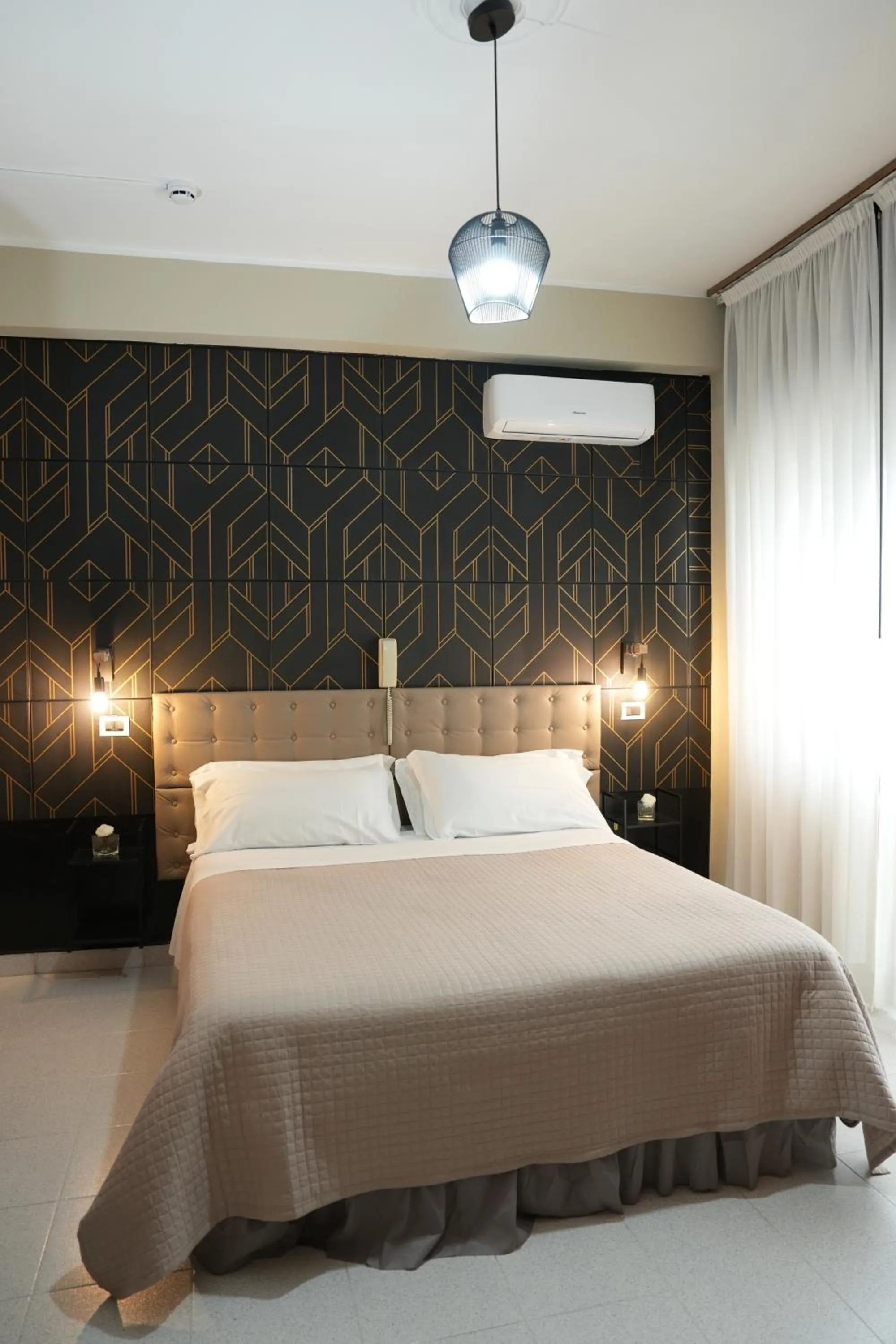 Bed in Hotel Marconi