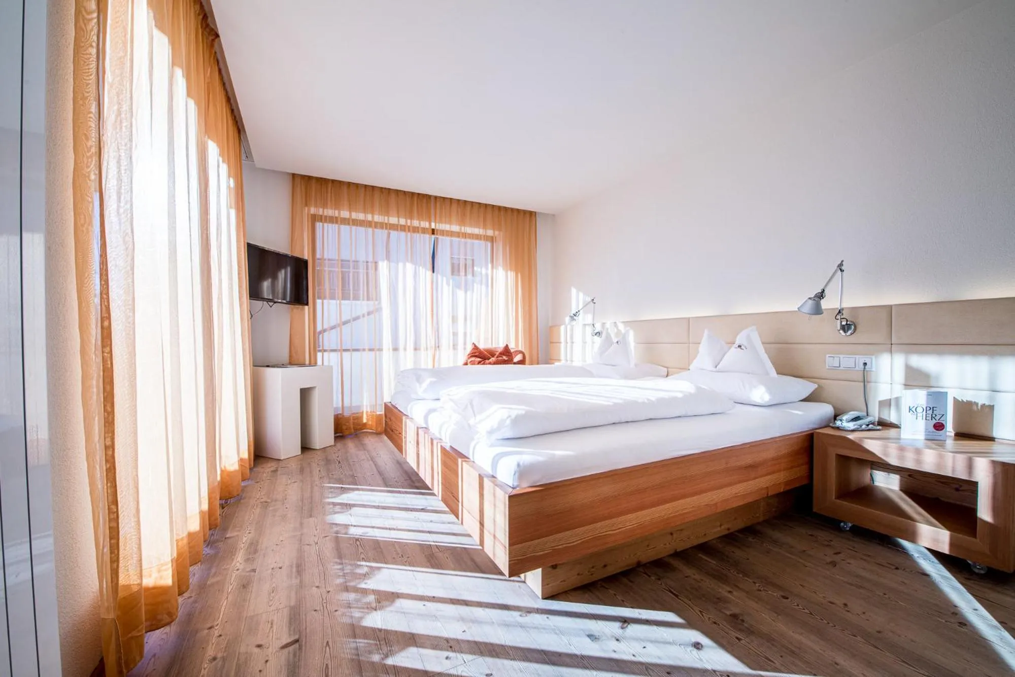 Bedroom, Bed in Alphotel Stocker Alpine Wellnesshotel