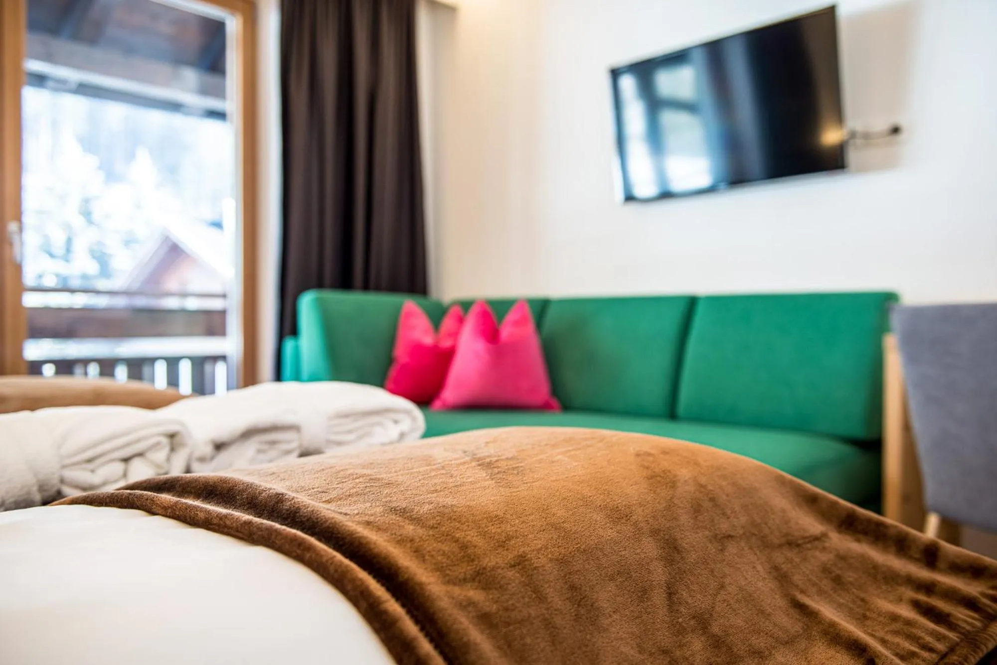 Seating area, Bed in Alphotel Stocker Alpine Wellnesshotel