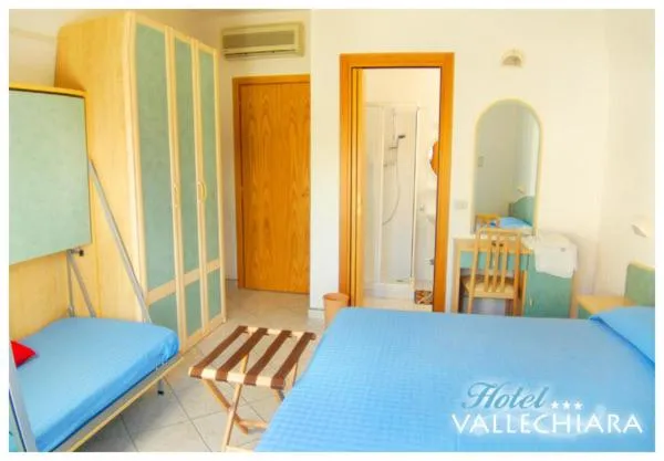 Text overlay, Bed in Hotel Vallechiara