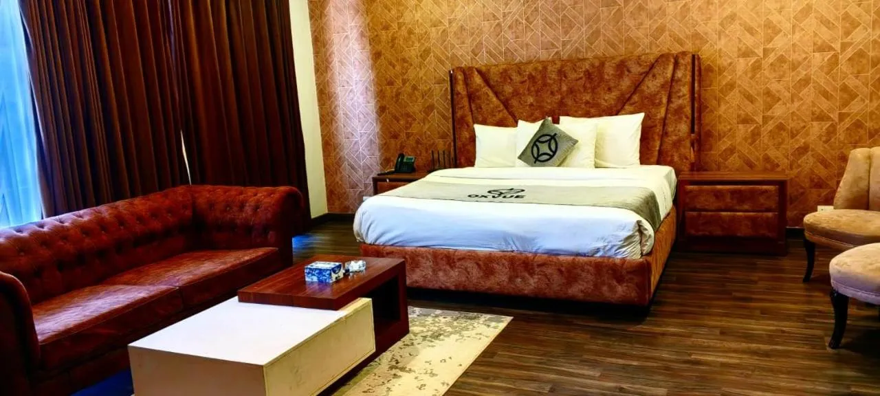 Bed in OXVUE Boutique Hotel