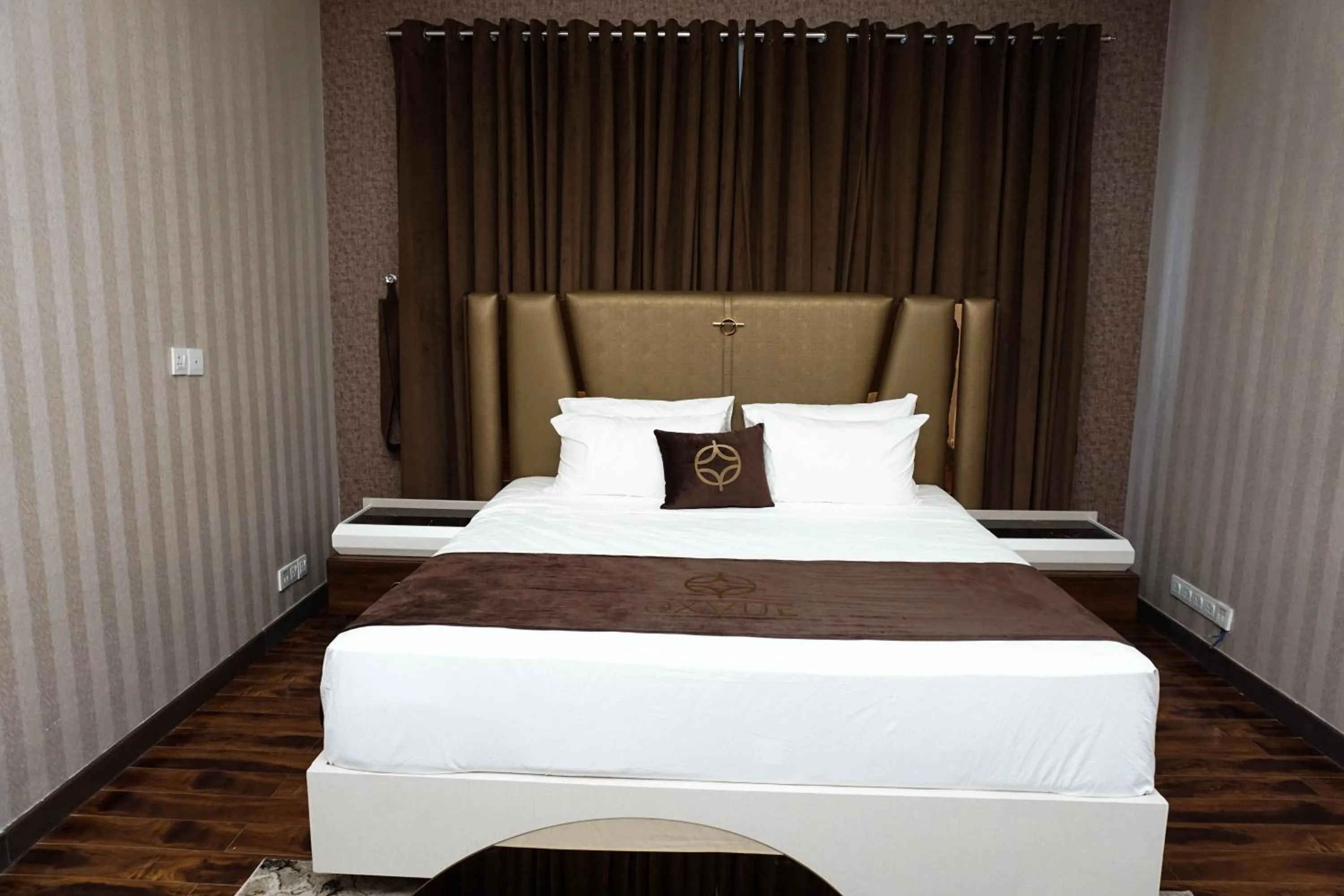 Bed in OXVUE Boutique Hotel