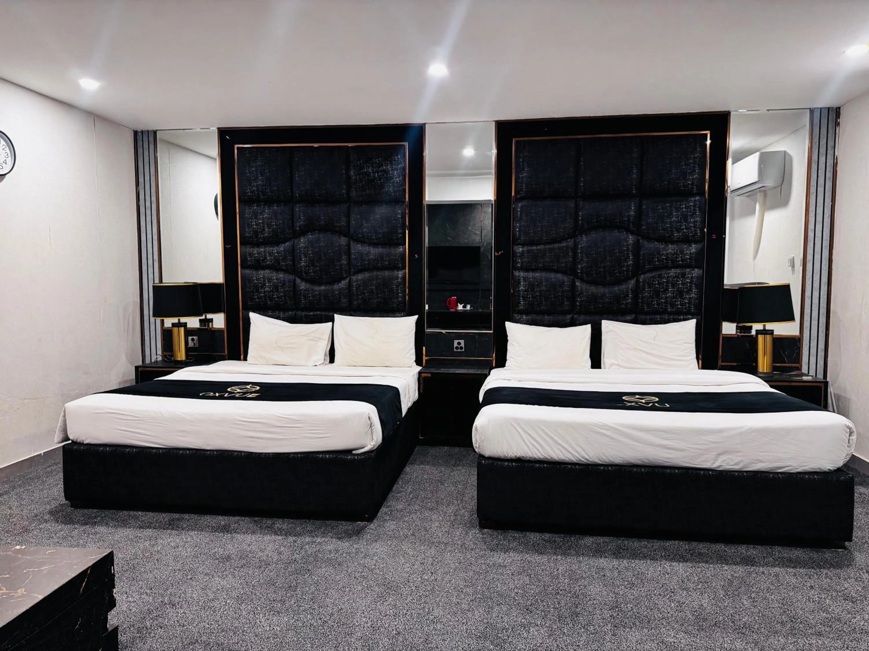 Bed in OXVUE Boutique Hotel