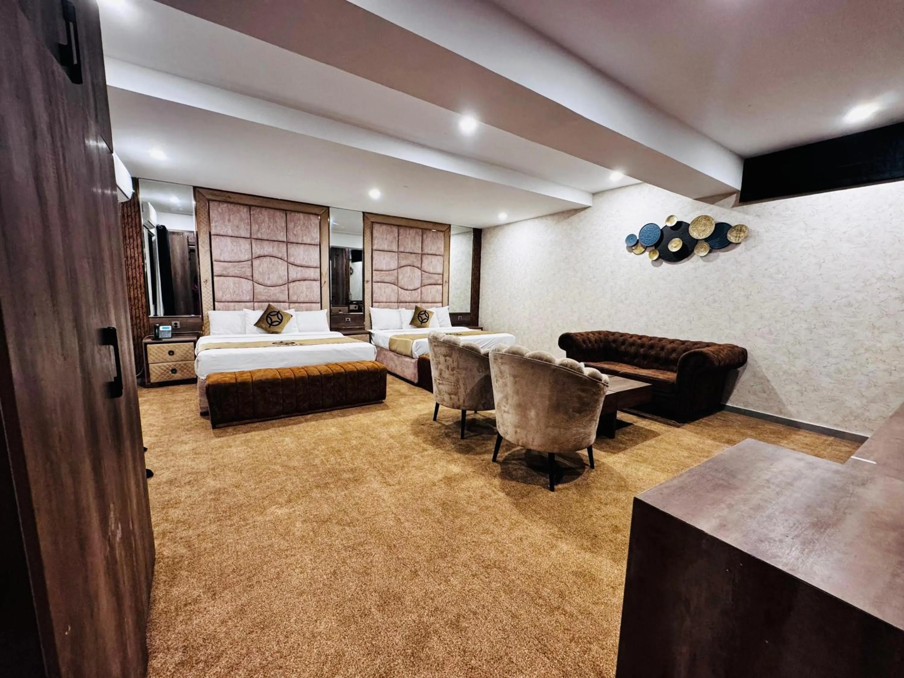 Bed in OXVUE Boutique Hotel