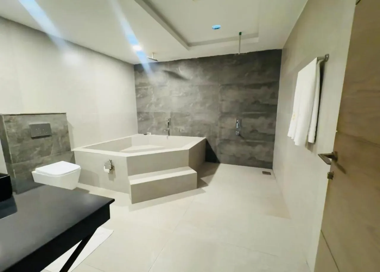 Shower in OXVUE Boutique Hotel