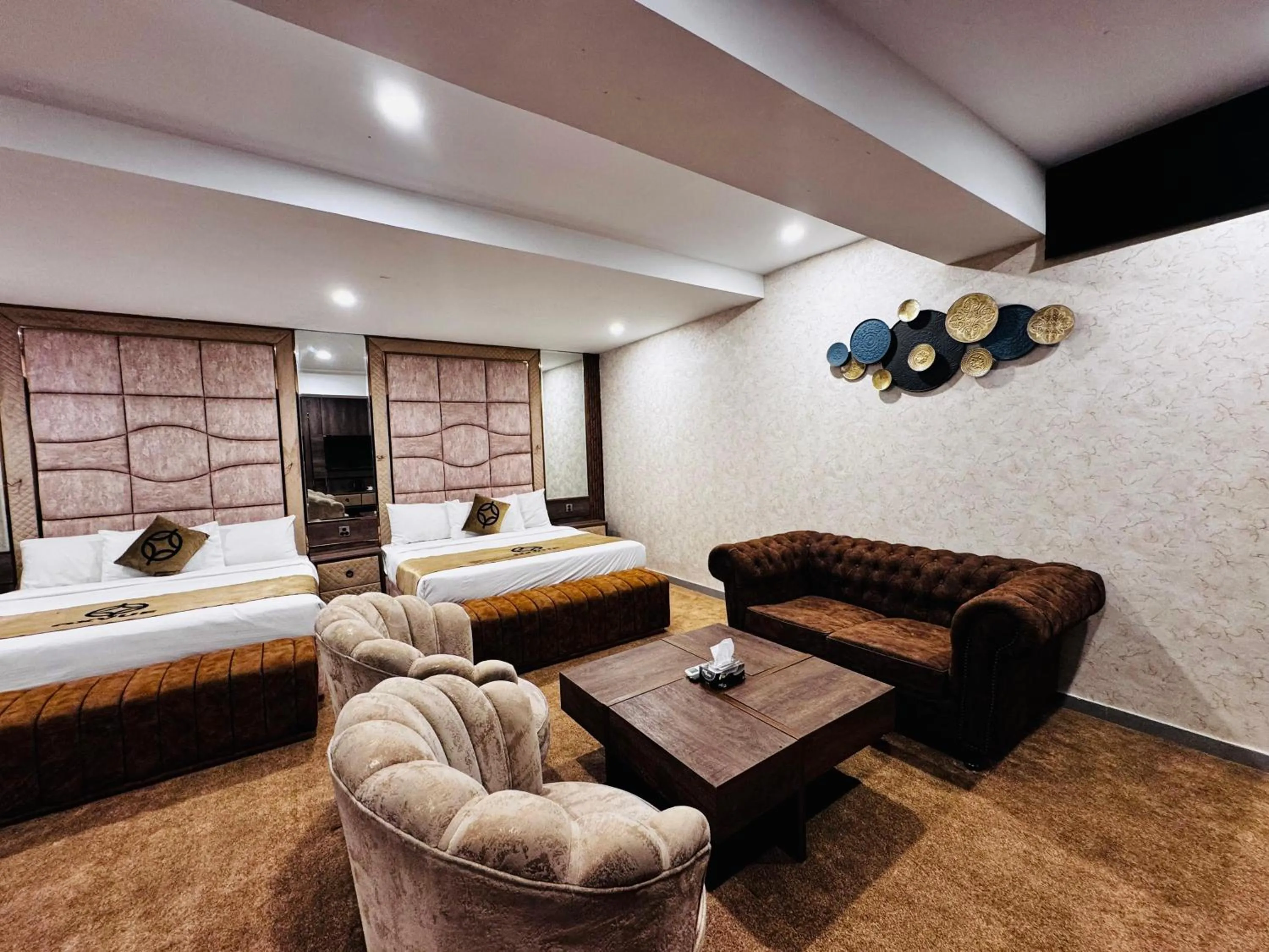 Bed in OXVUE Boutique Hotel