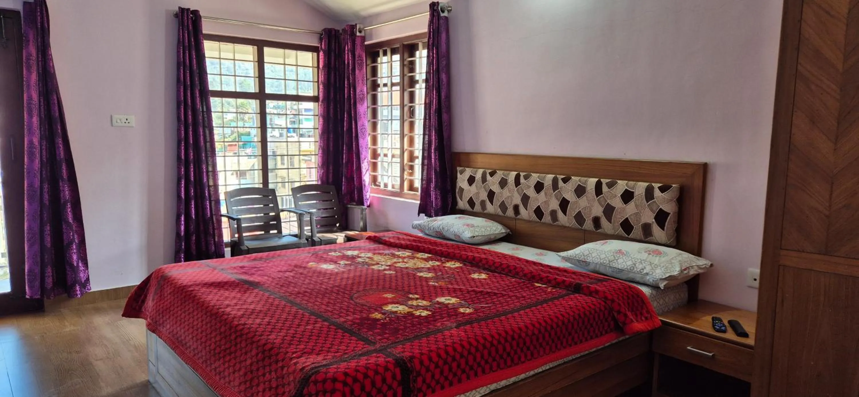 Bedroom, Bed in Karpagam Residency