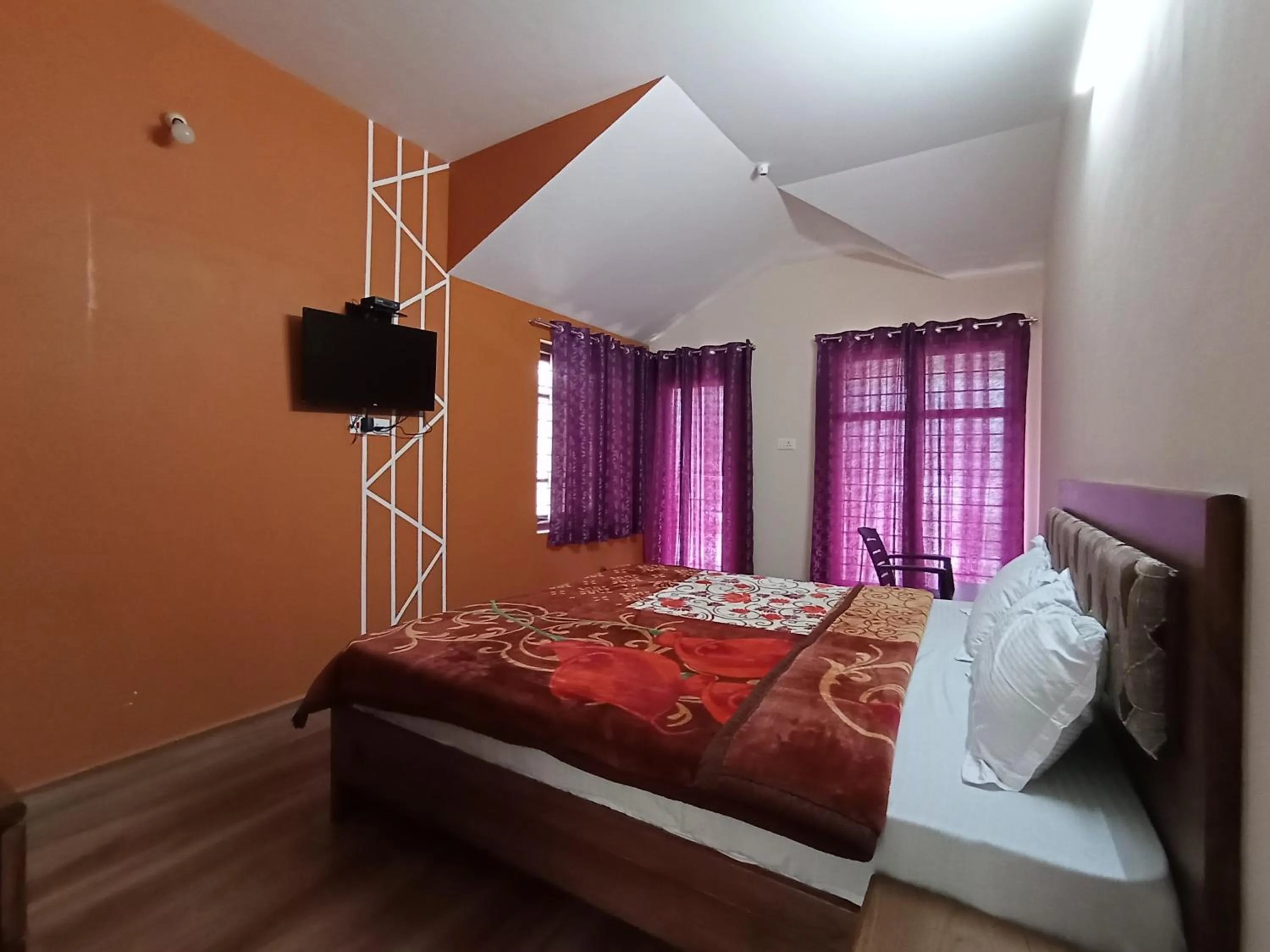 Photo of the whole room, Bed in Karpagam Residency
