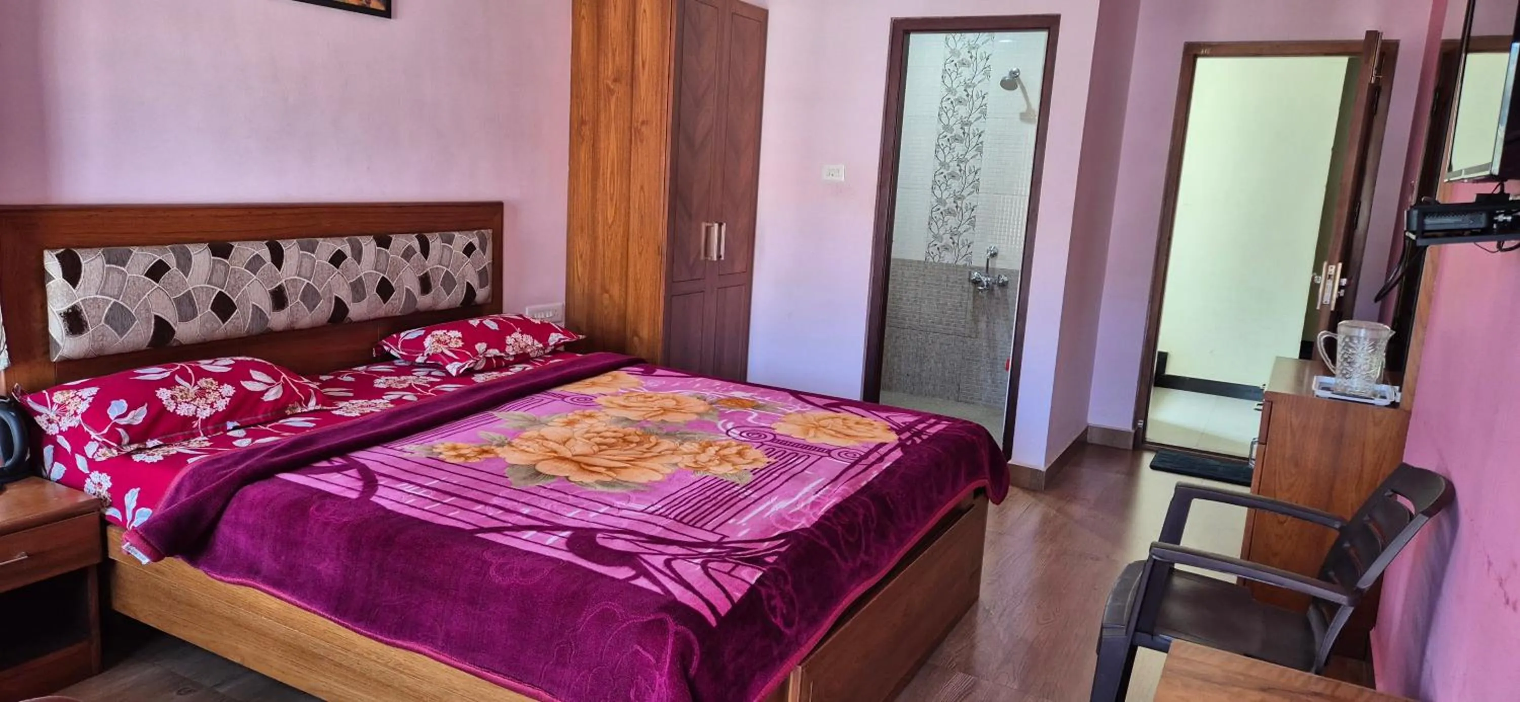 Bedroom, Bed in Karpagam Residency