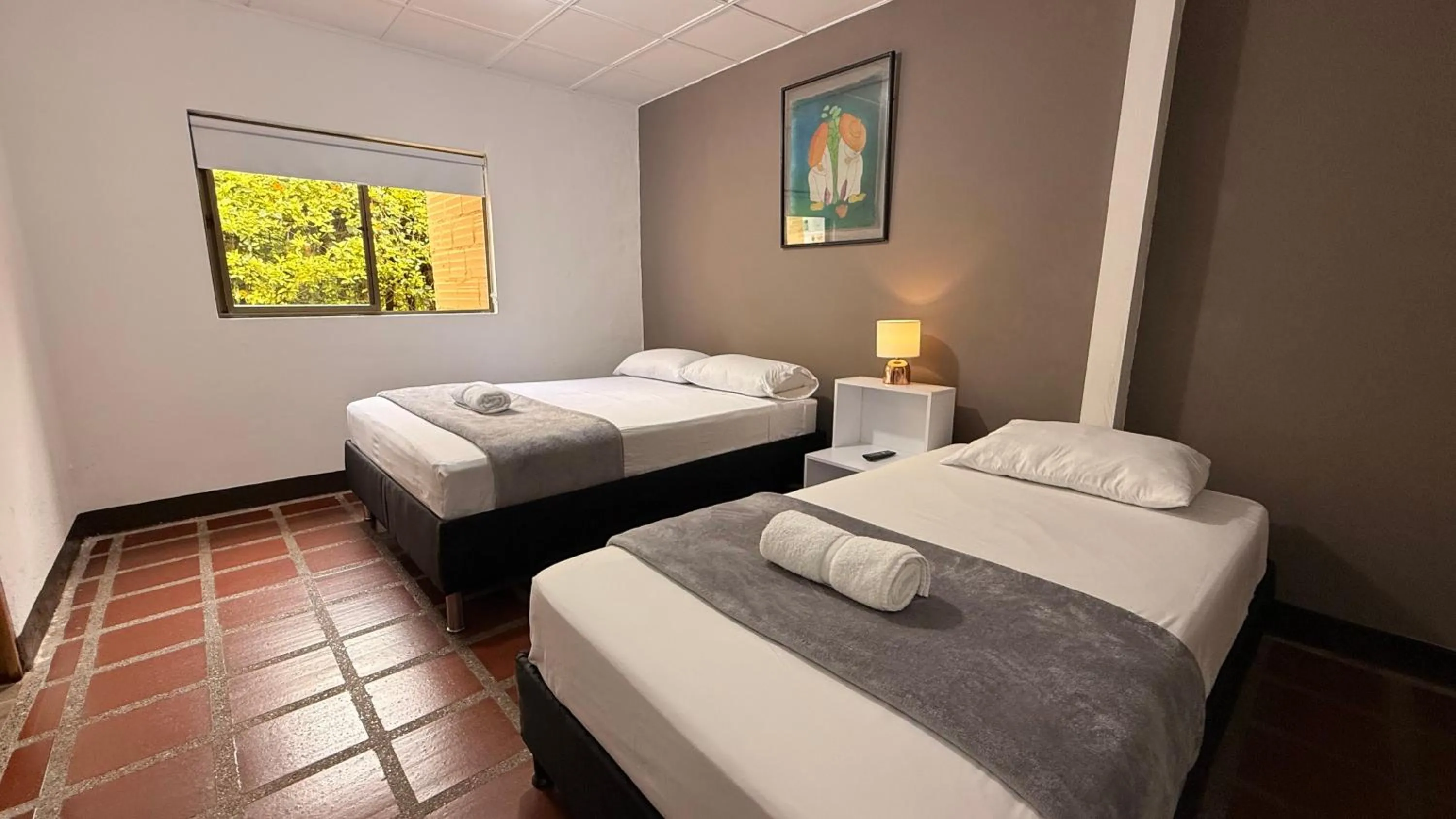 Photo of the whole room, Bed in Hotel CSI Llanogrande