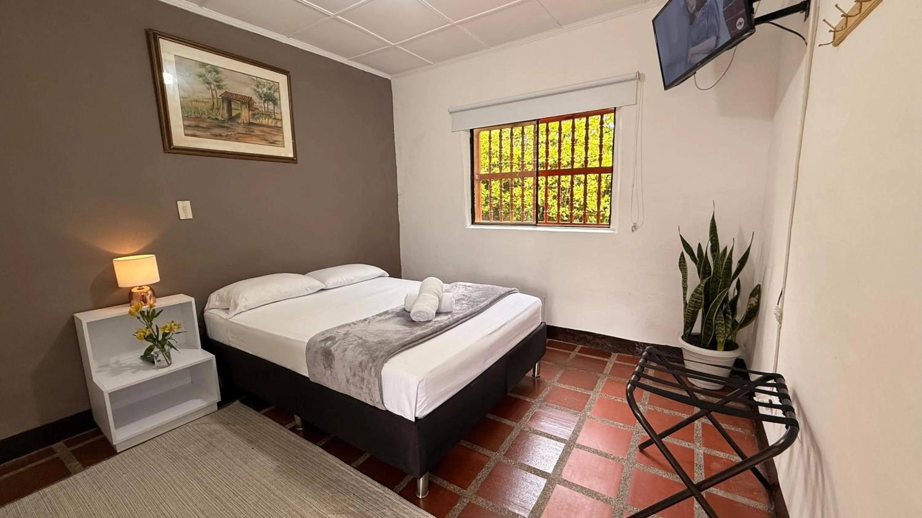 Photo of the whole room, Bed in Hotel CSI Llanogrande