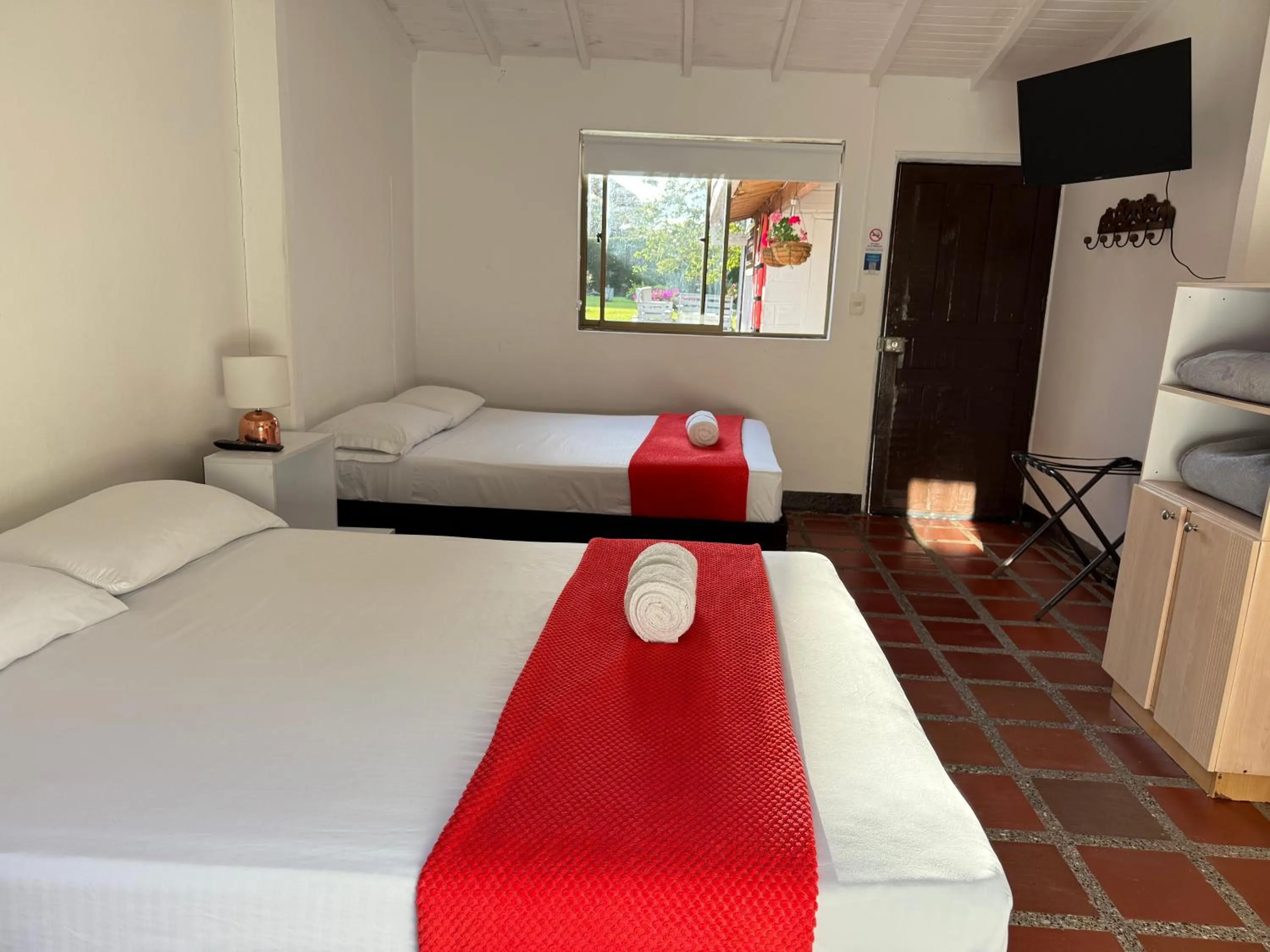 Photo of the whole room, Bed in Hotel CSI Llanogrande