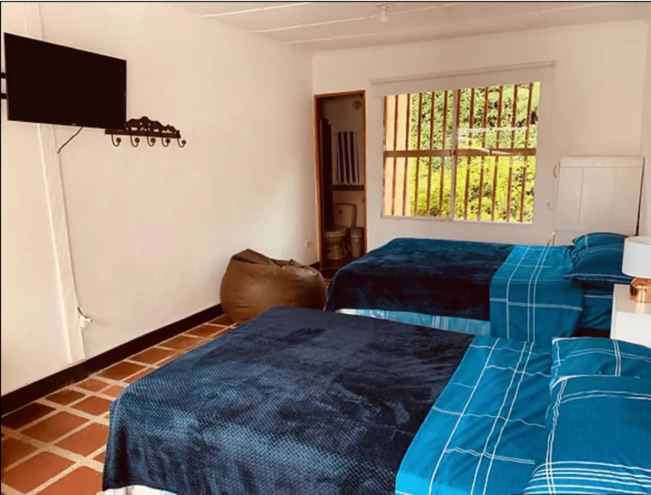 Photo of the whole room, Bed in Hotel CSI Llanogrande