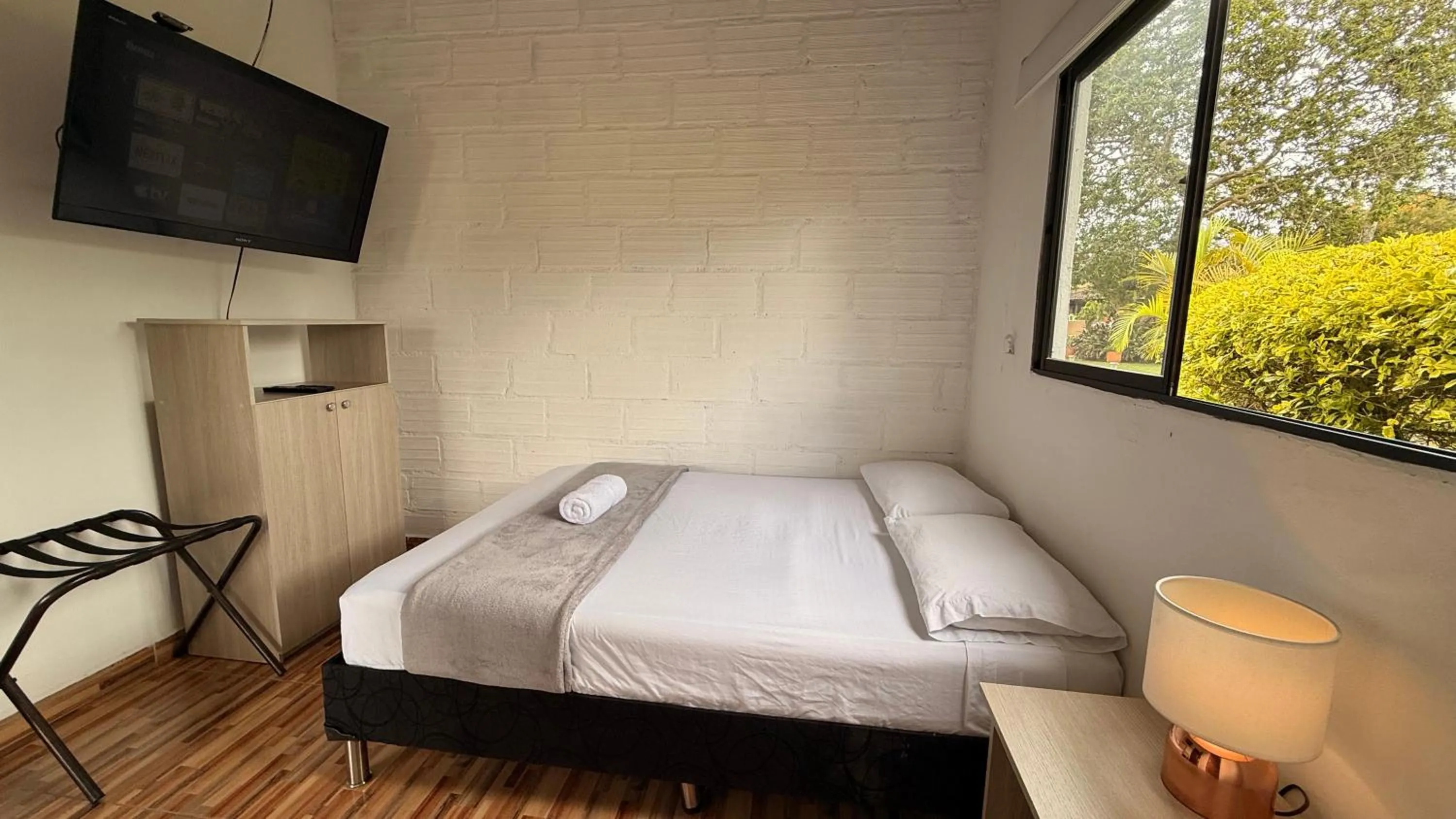 Photo of the whole room, Bed in Hotel CSI Llanogrande