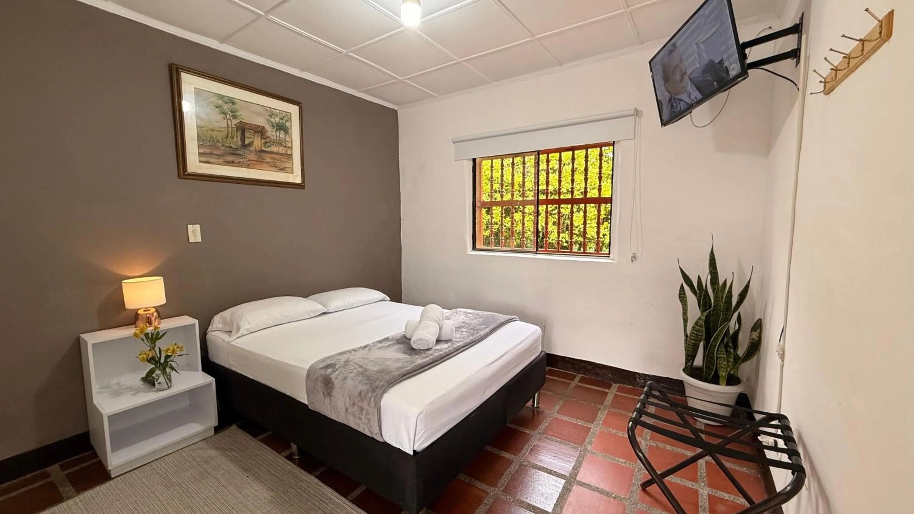 Photo of the whole room, Bed in Hotel CSI Llanogrande